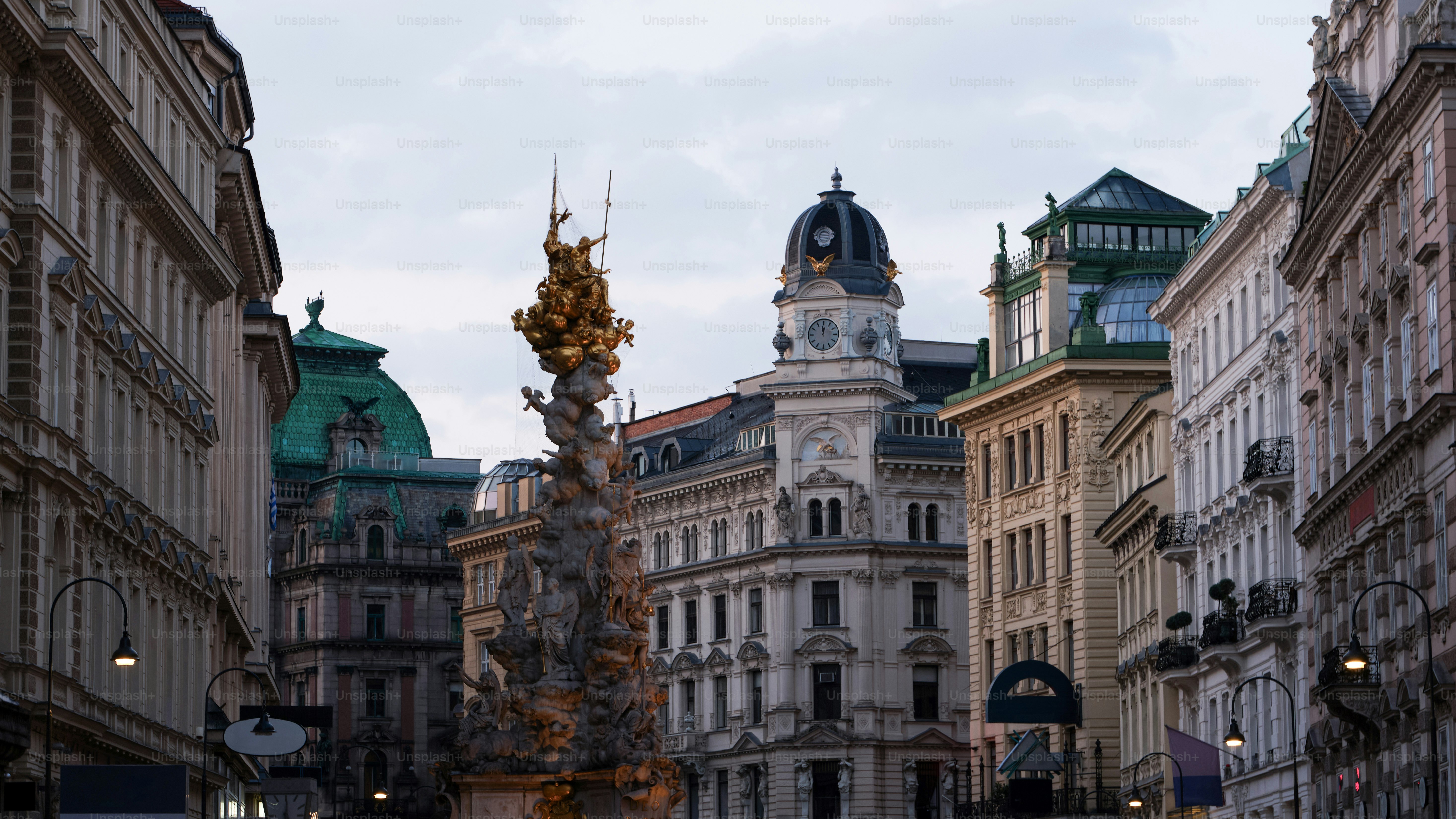 a clock tower in the middle of a city