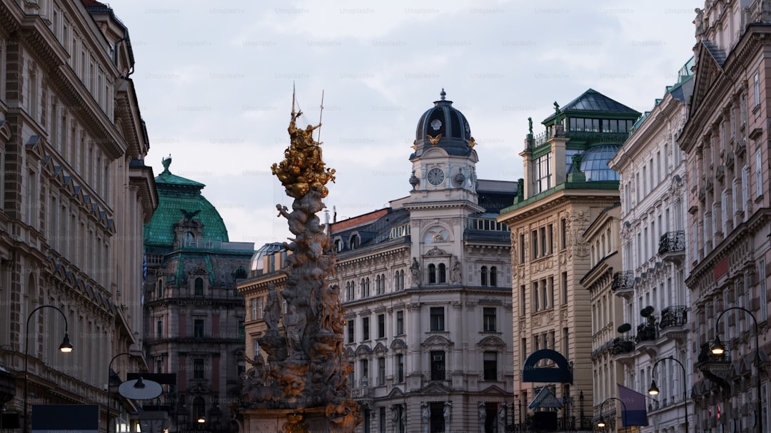 a clock tower in the middle of a city