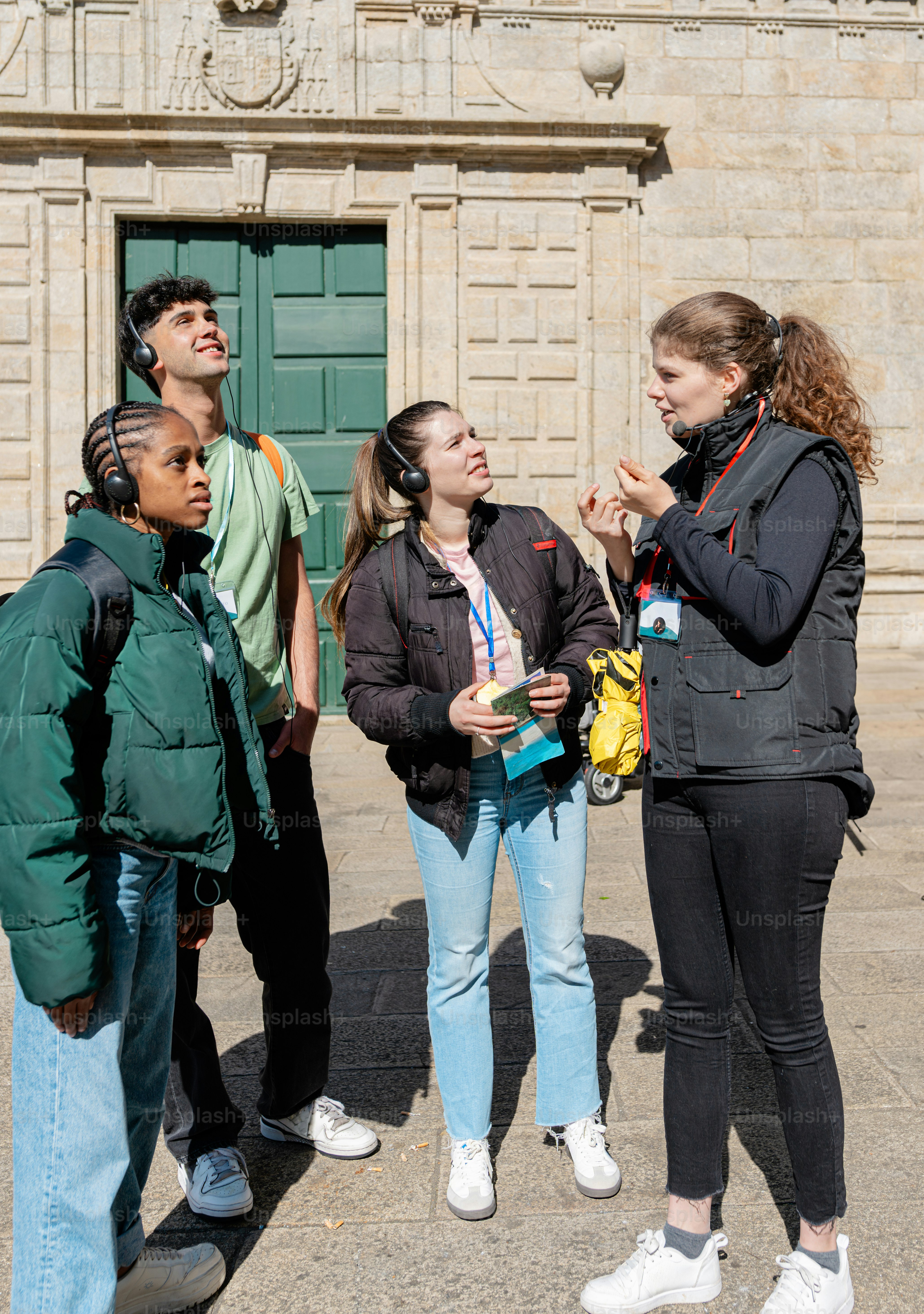 a group of people standing in front of a building