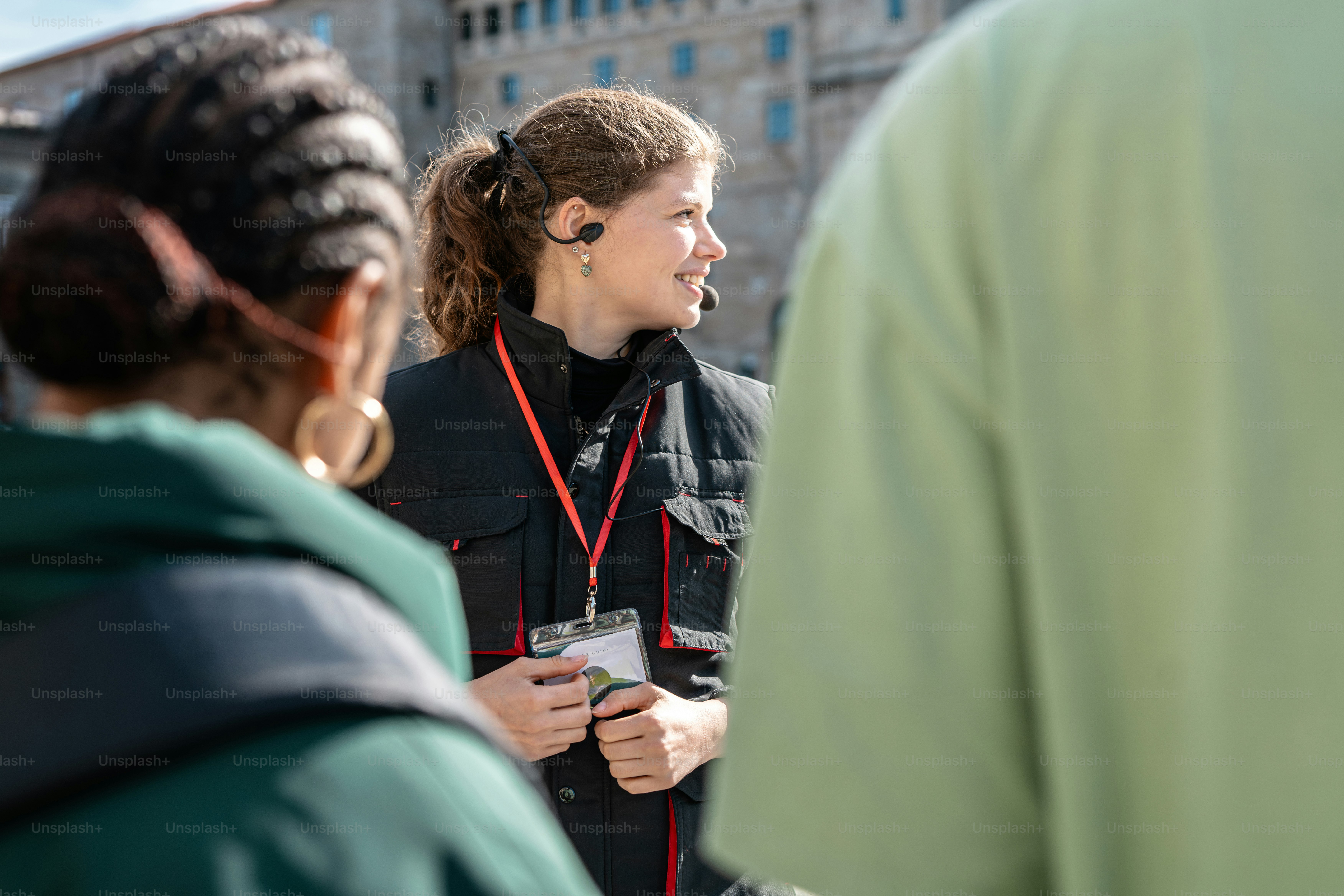 a woman talking to a group of people