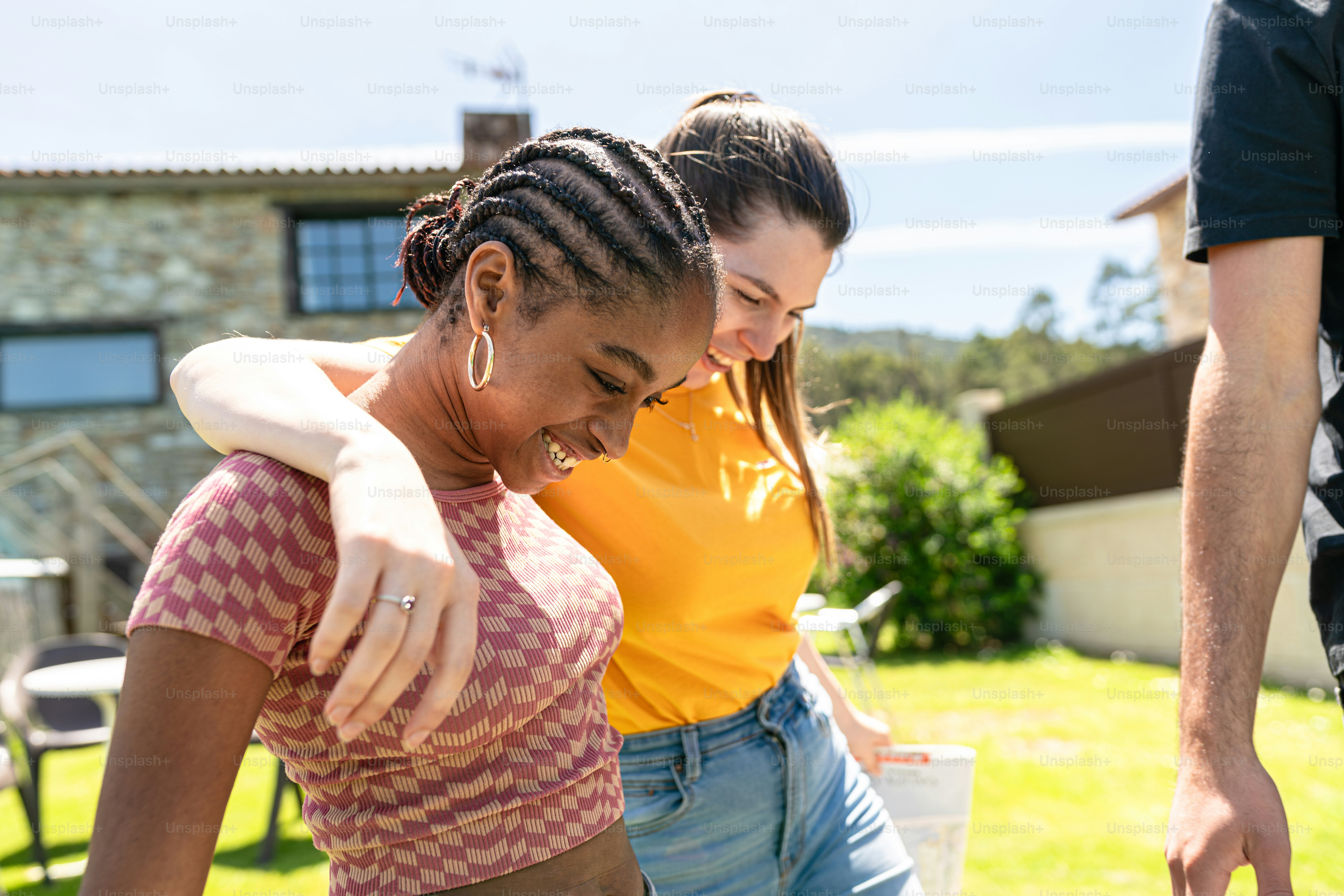 a couple of women standing next to each other