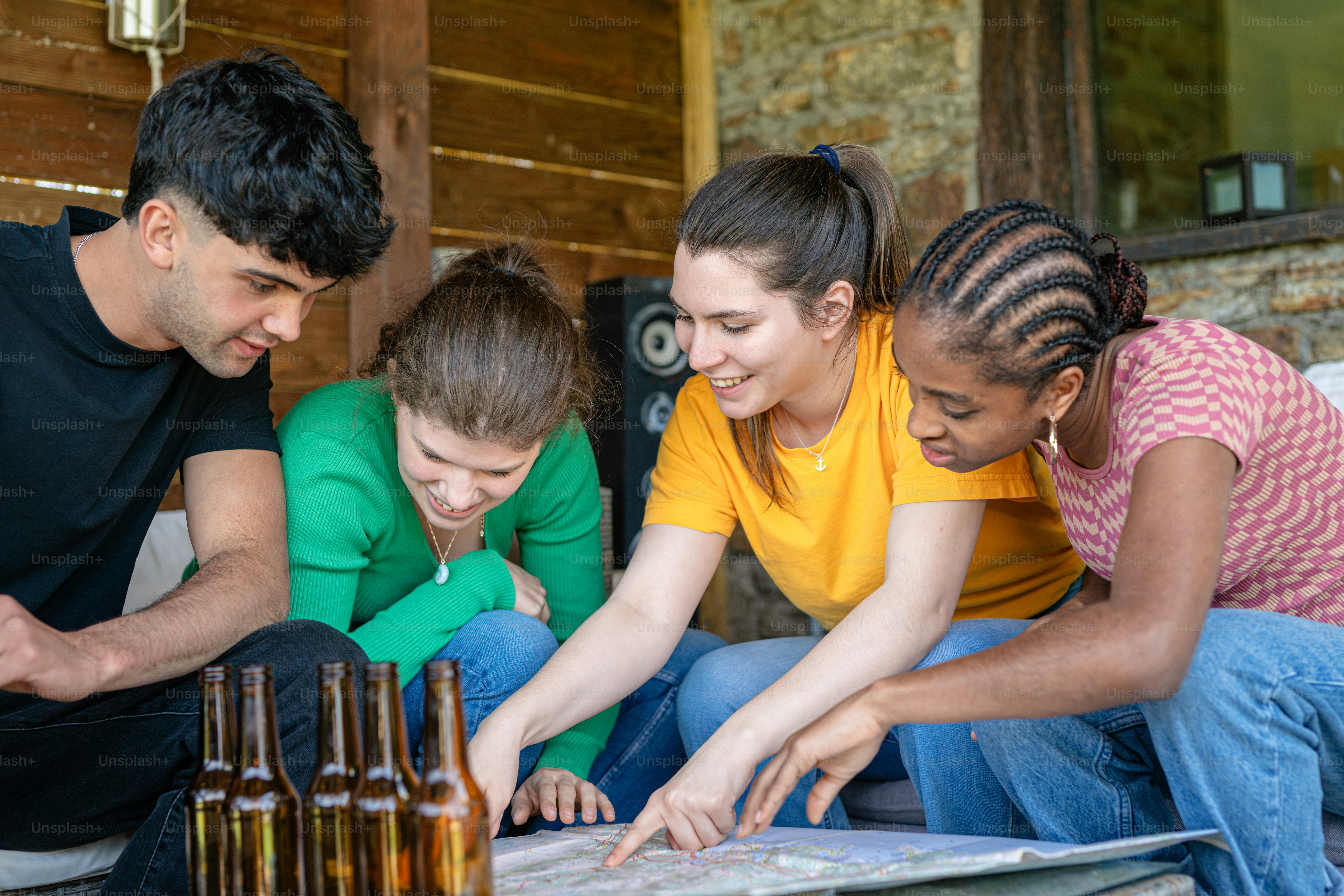 a group of people looking at a map