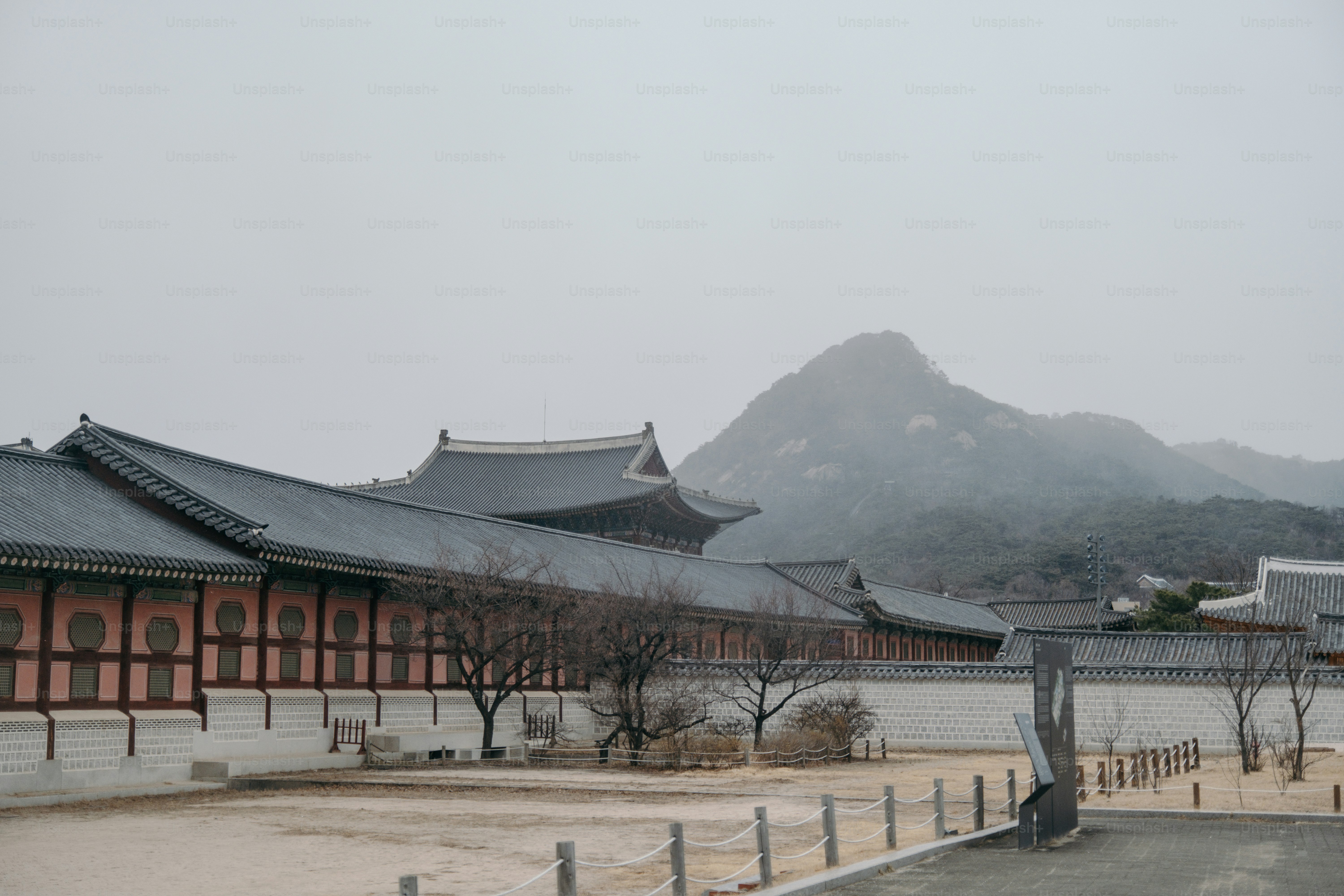 a building with a mountain in the background