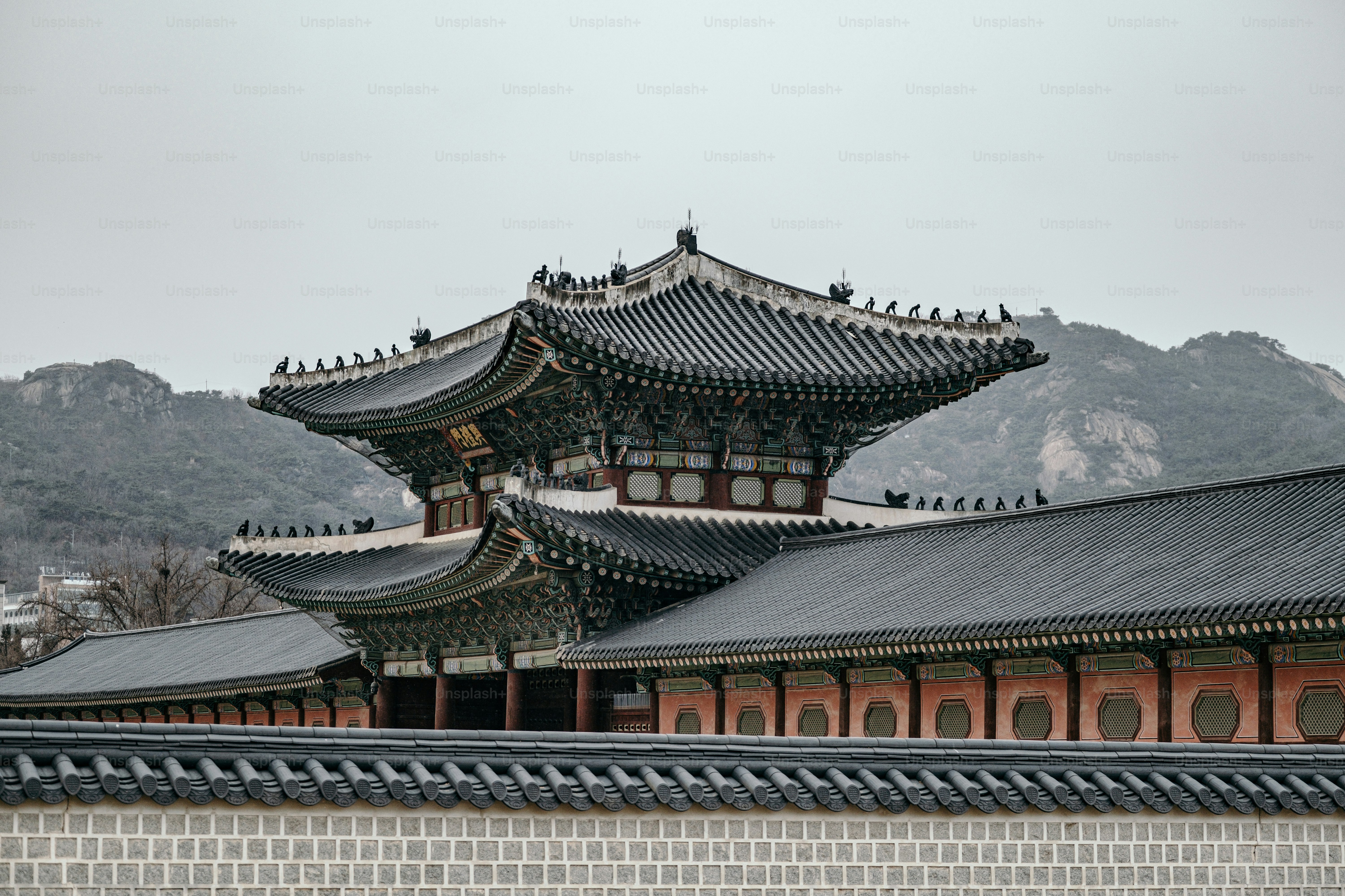 Gyeongbokgung Palace is the largest and most grandiose of the five palaces, built in 1395. Its main throne hall is the Geunjeongjeon, which was used for important royal ceremonies and meetings with foreign envoys. The hall features a spacious, open courtyard and a raised platform with a throne for the king.