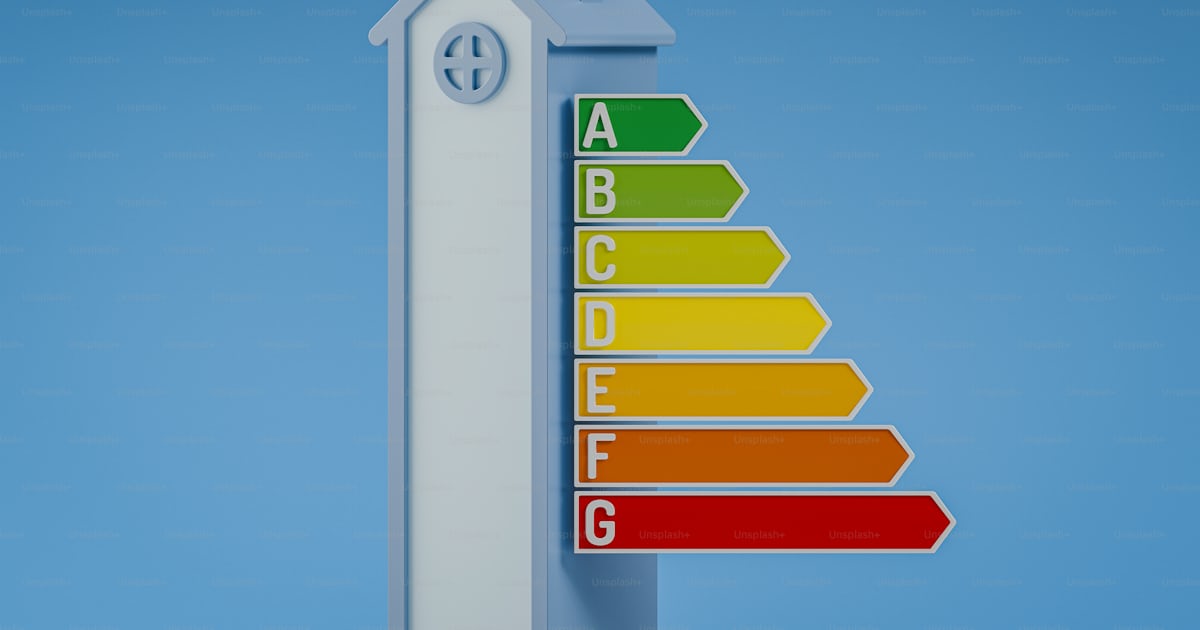 An energy efficiency sign with a blue sky in the background photo ...