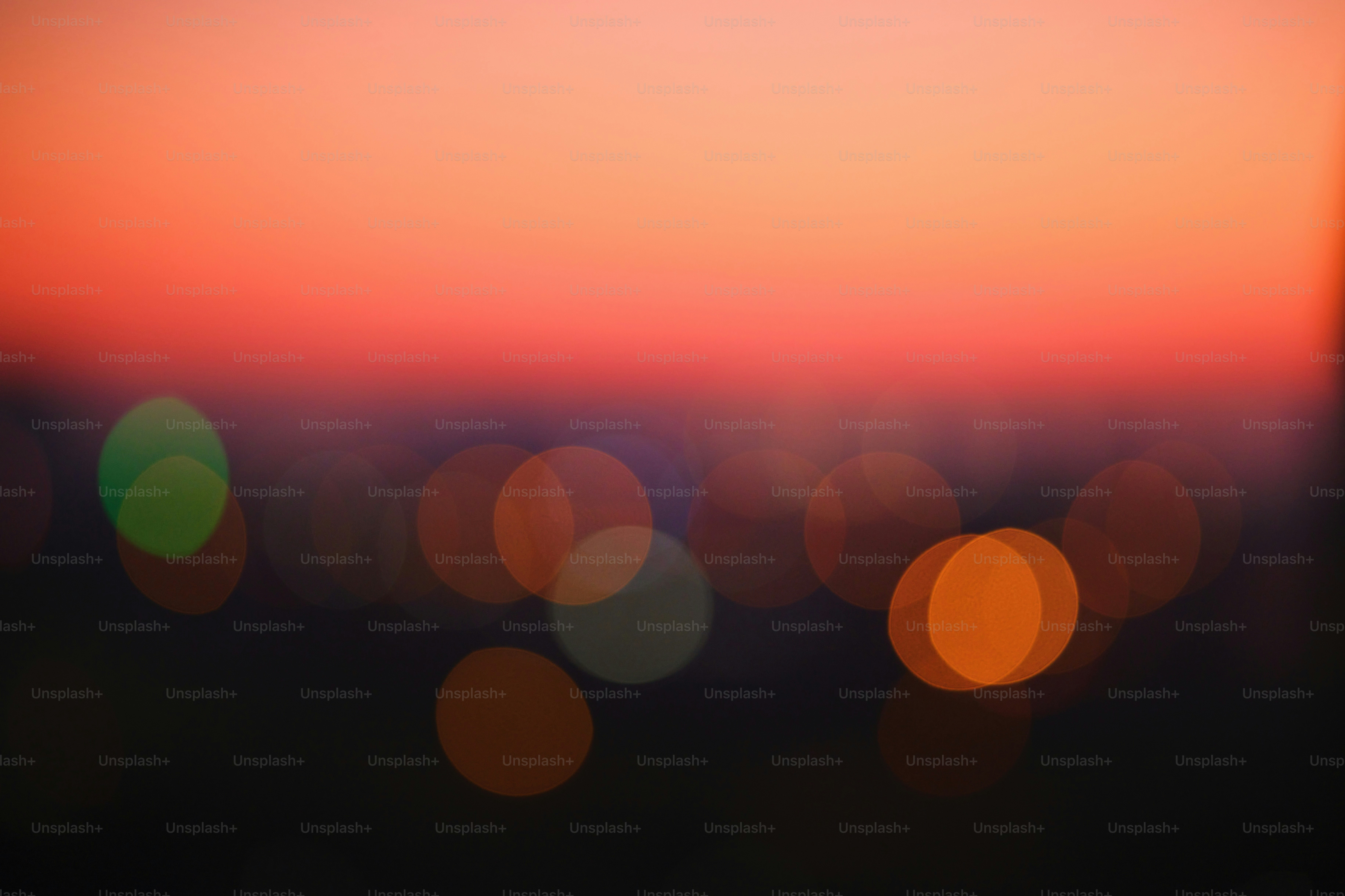 a blurry photo of a sunset with a blurry background