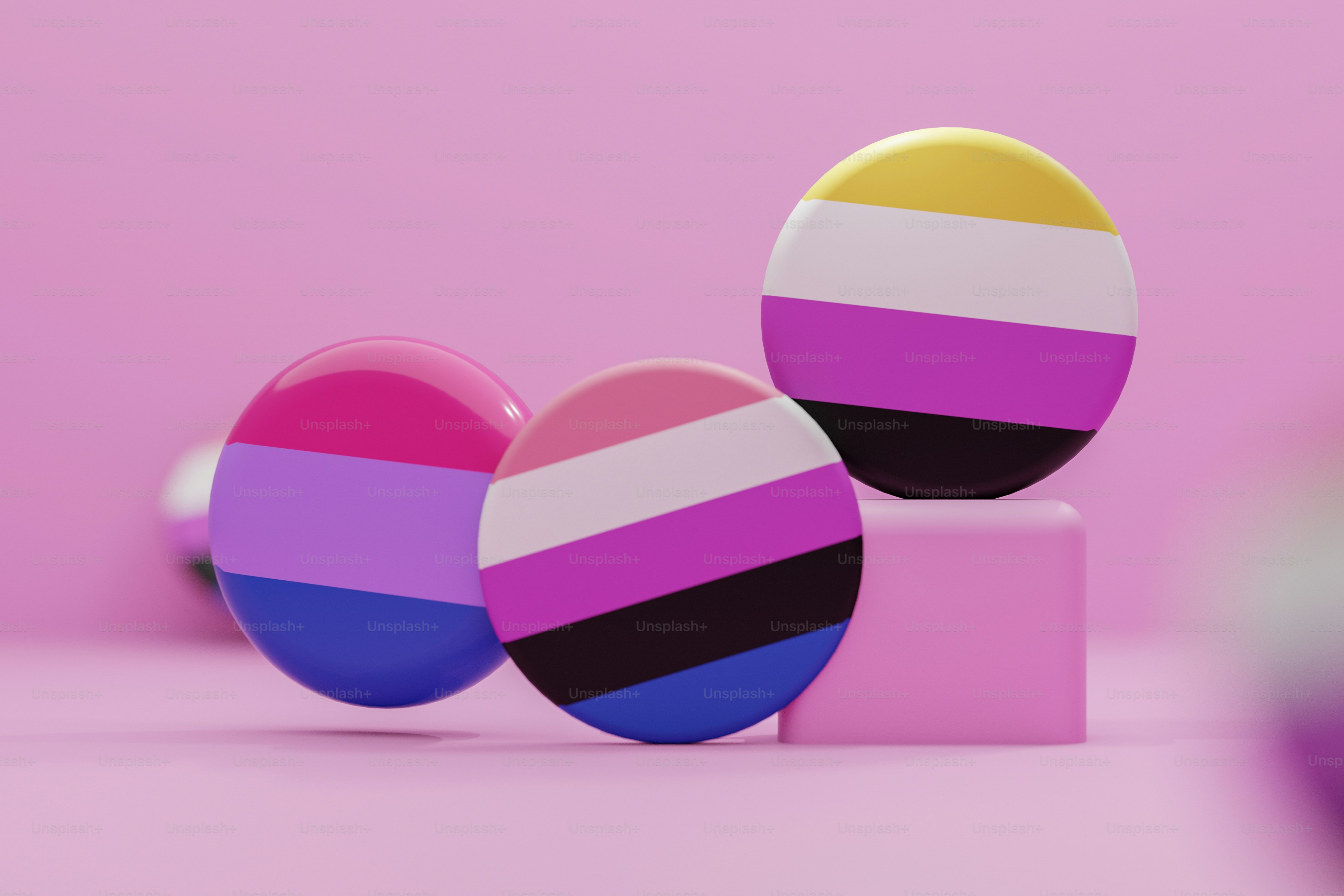 a couple of colorful eggs sitting on top of a table