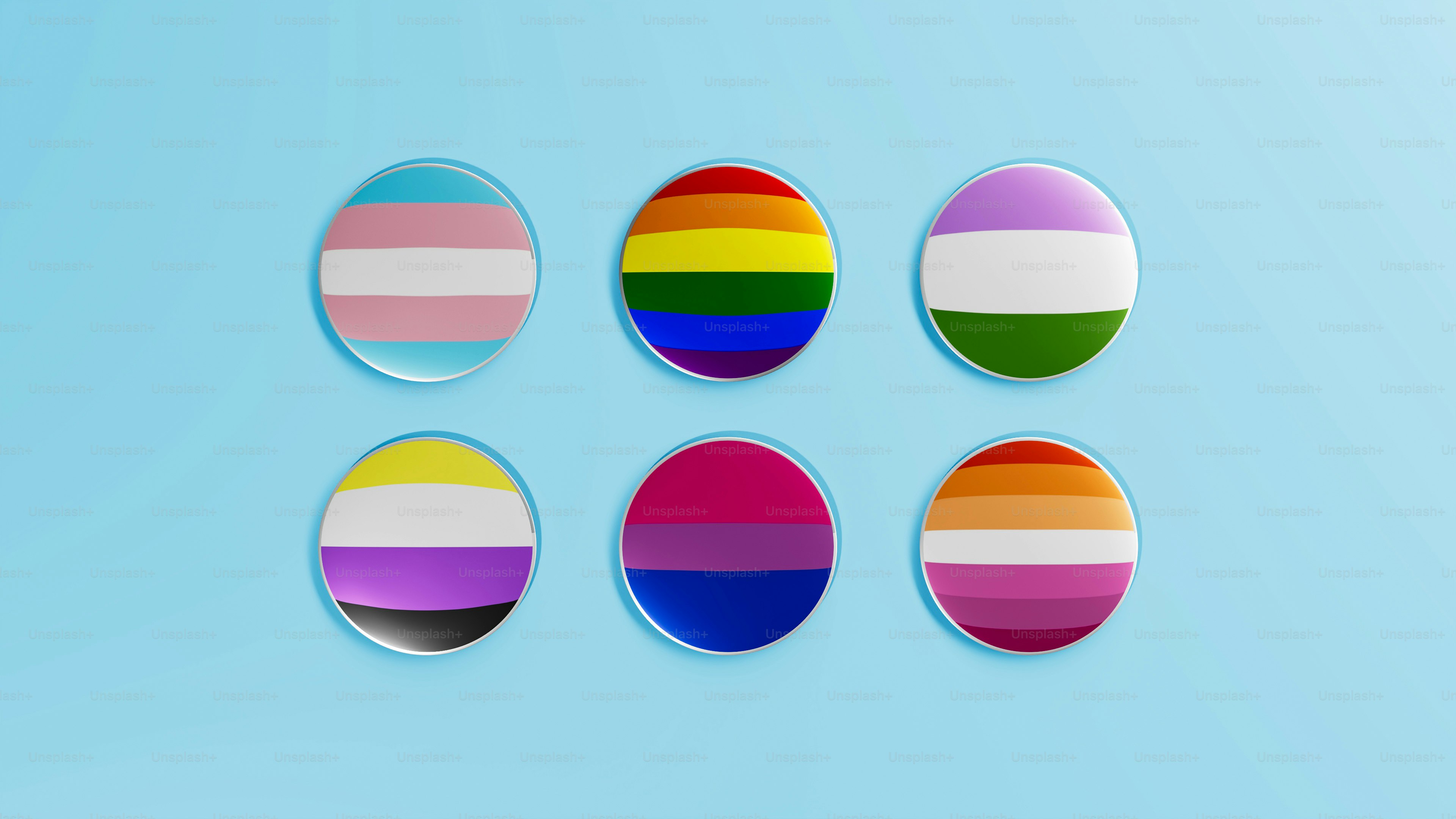 a set of four different colored circles on a blue background