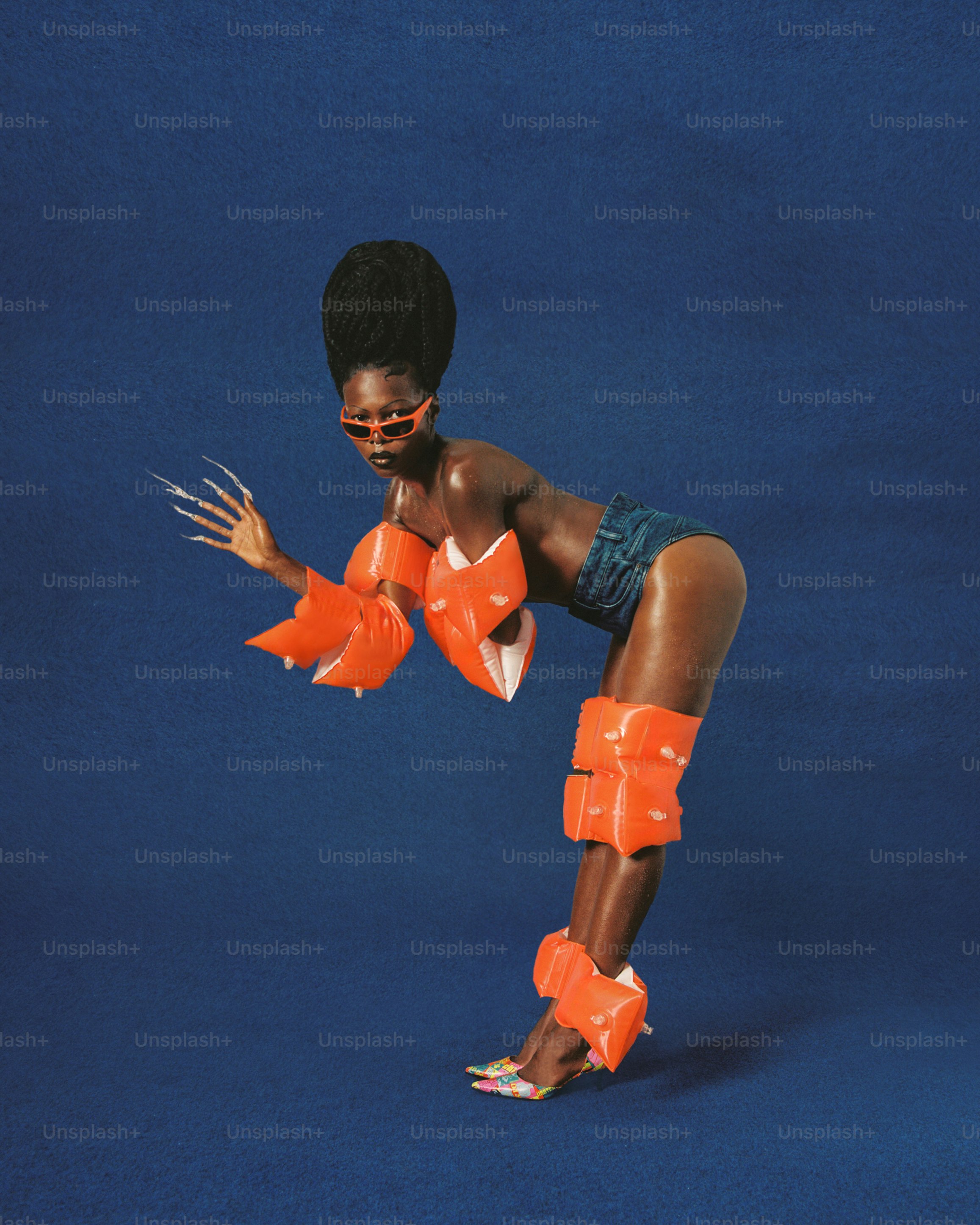 a woman in a short skirt and orange gloves