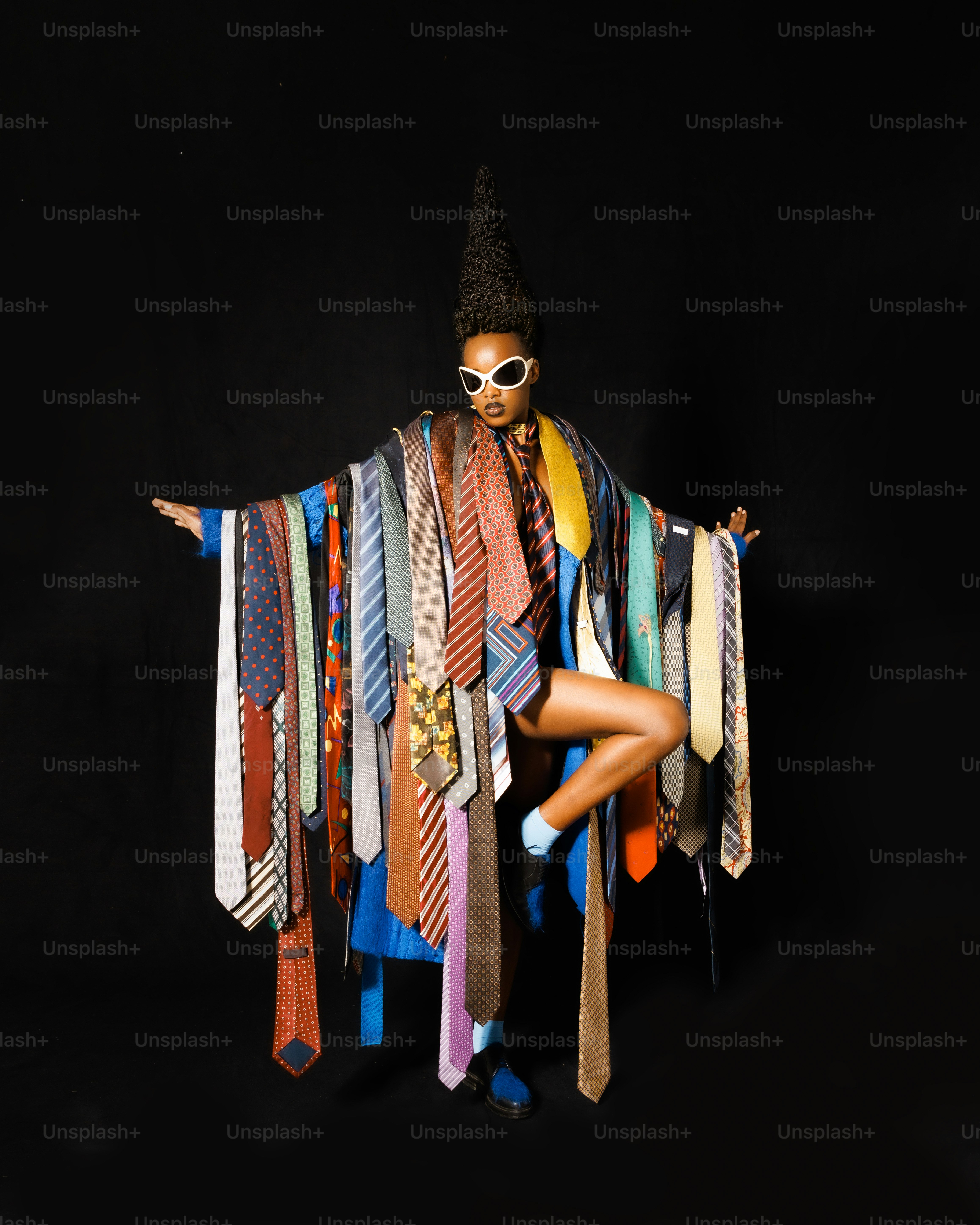 a woman wearing a costume made of ties