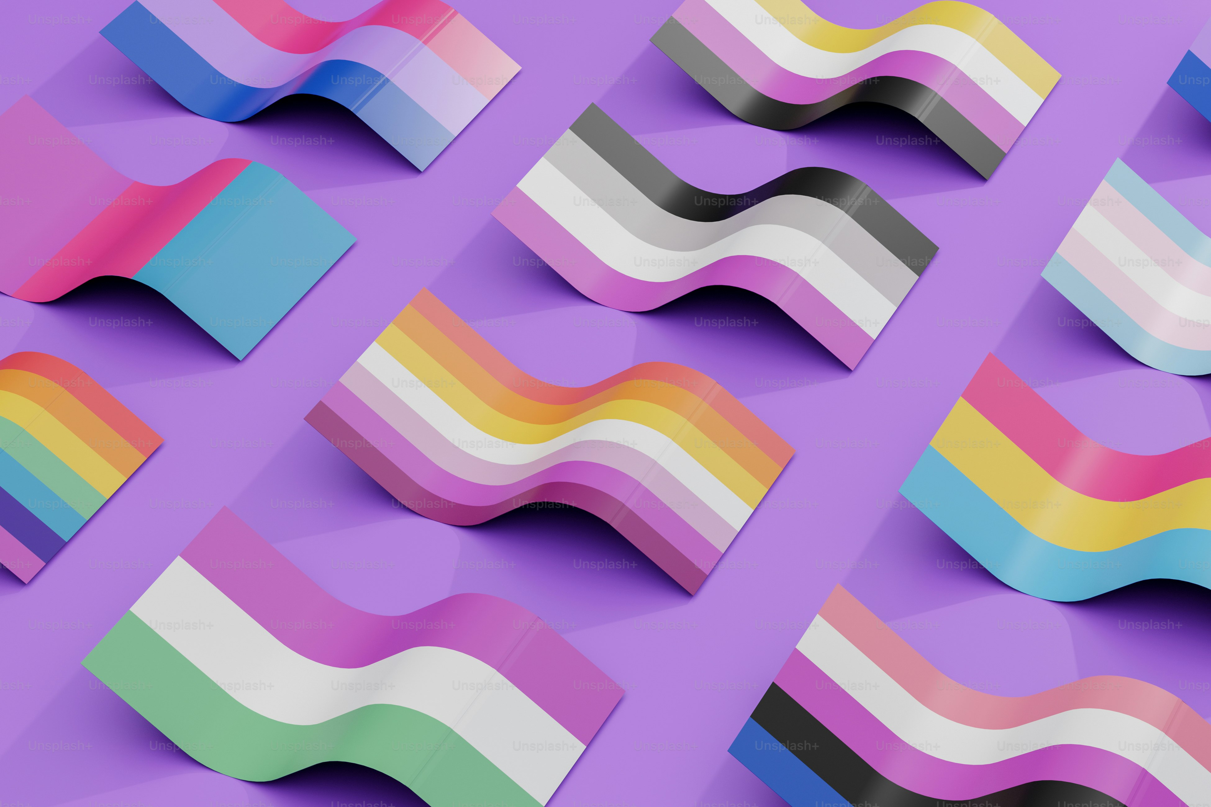 a group of colorful wavy shapes on a purple background