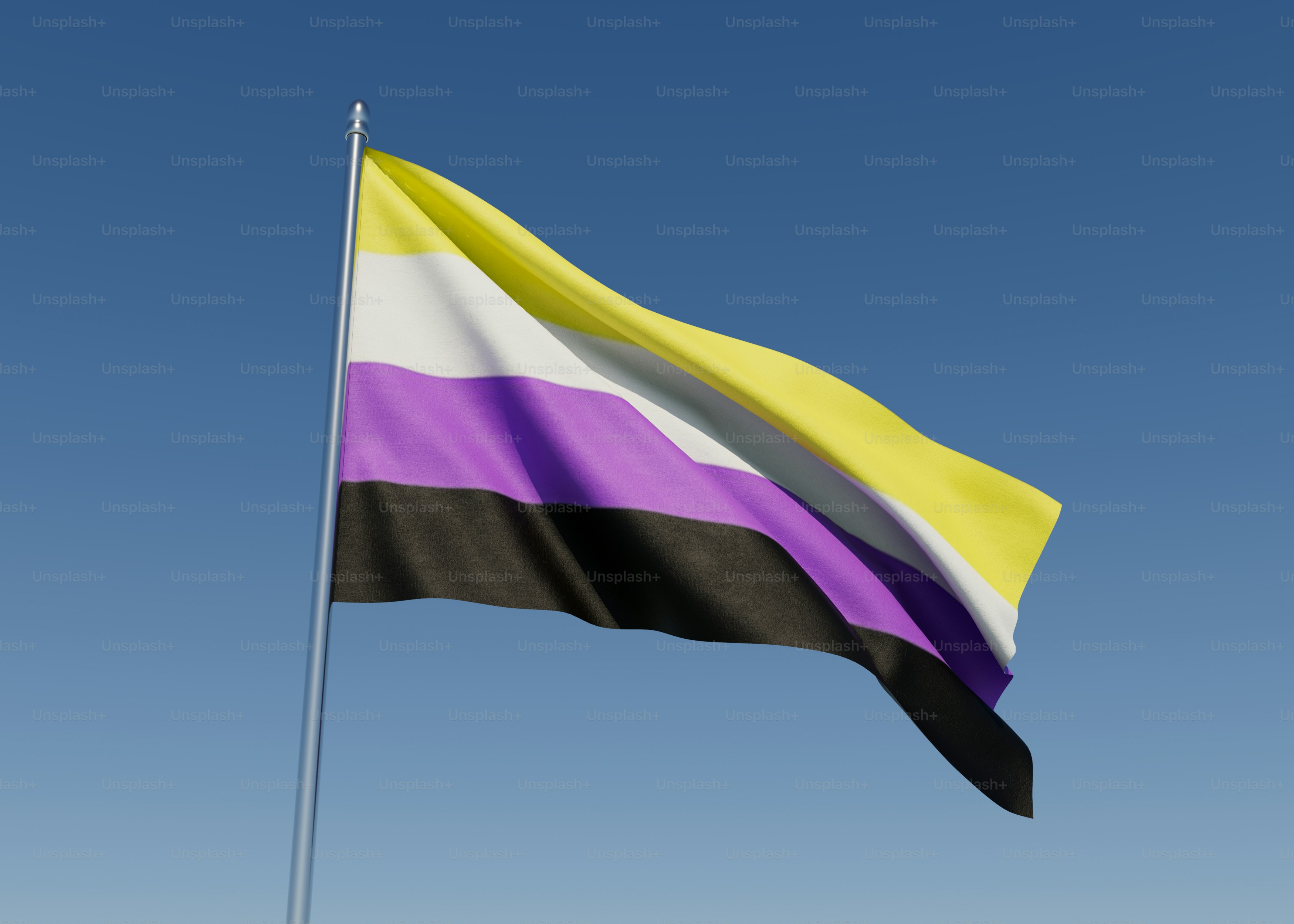 una bandera ondeando al viento con un cielo azul en el fondo