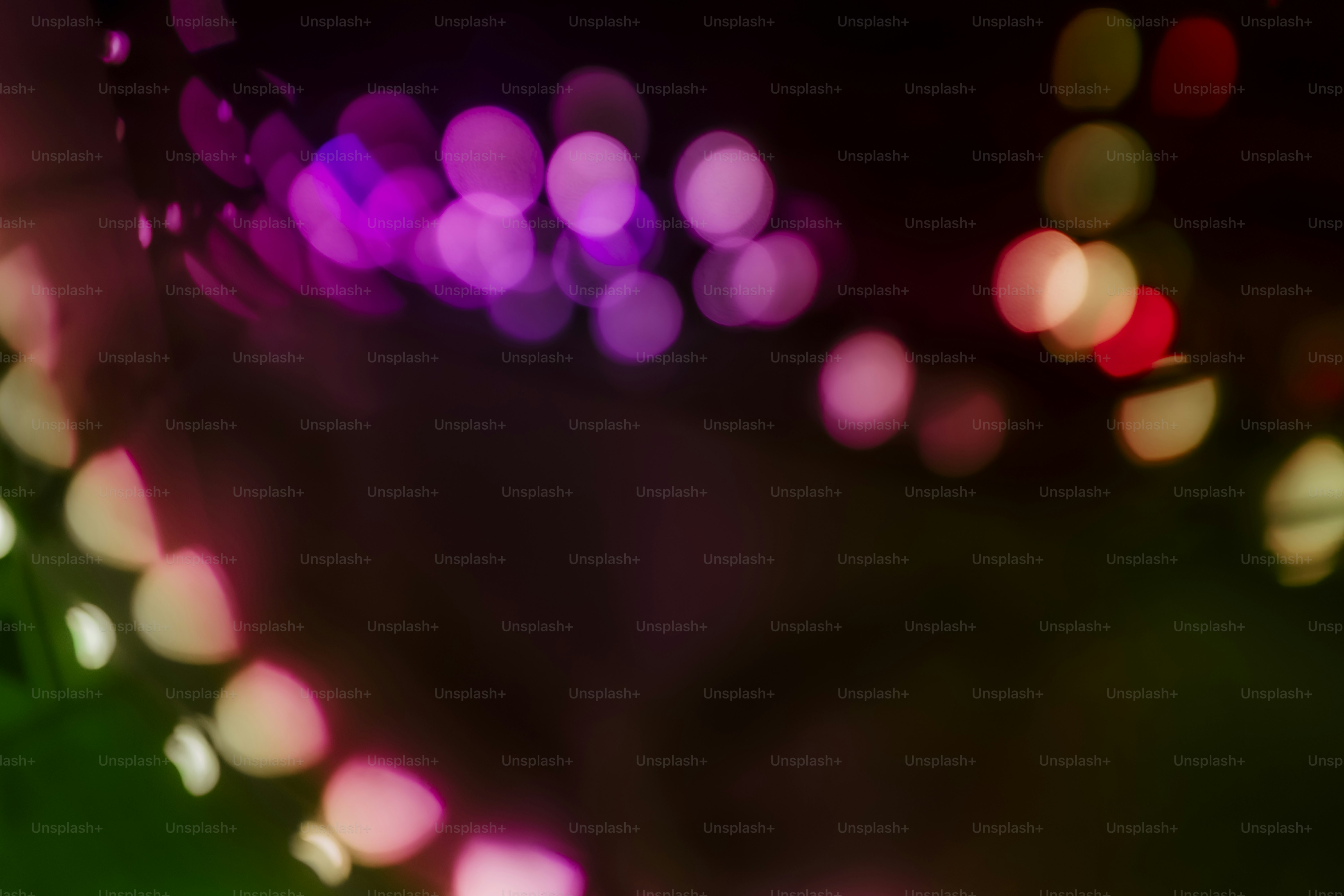 a blurry photo of lights in the dark