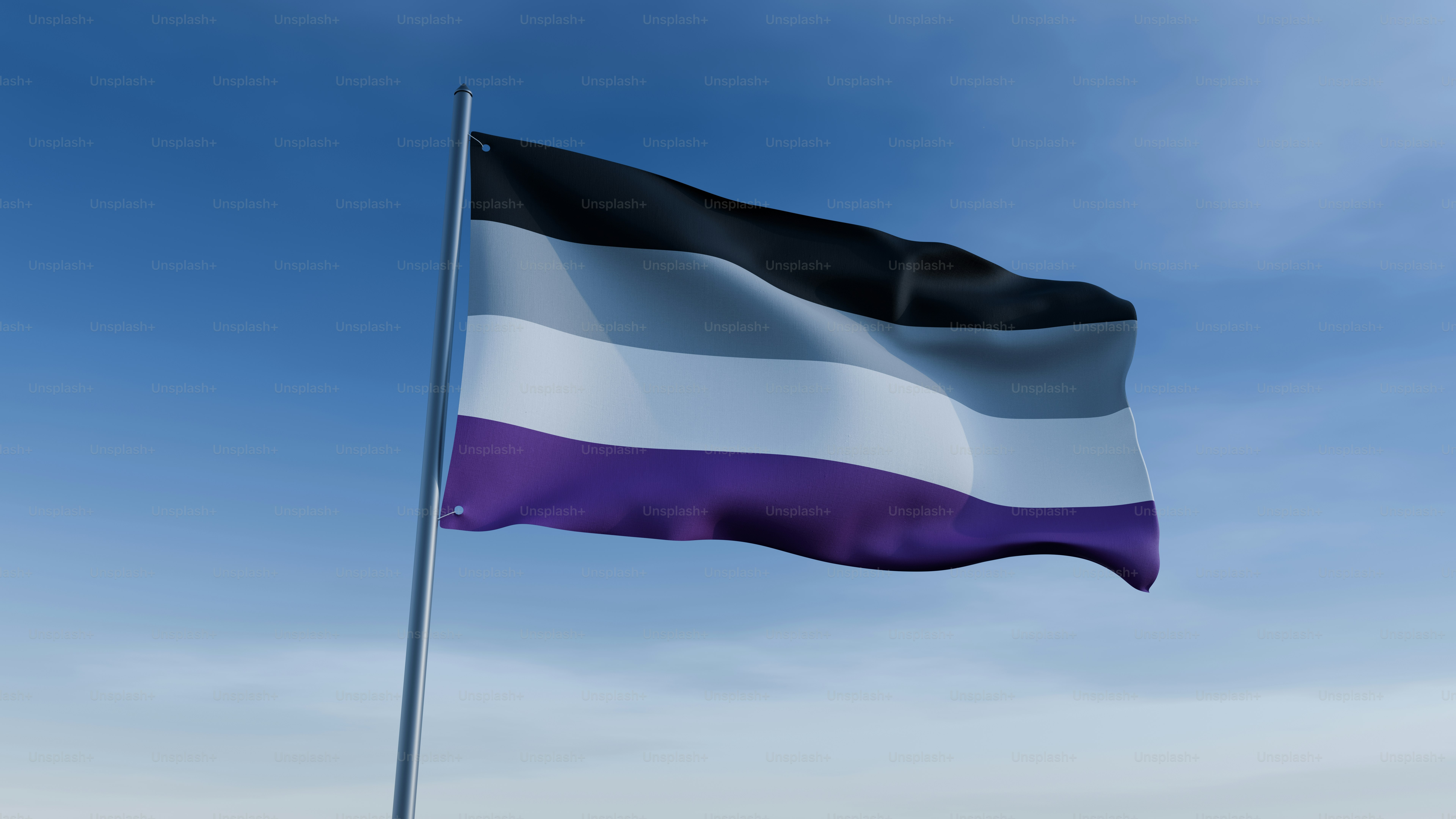 Bendera berkibar tertiup angin di hari yang cerah