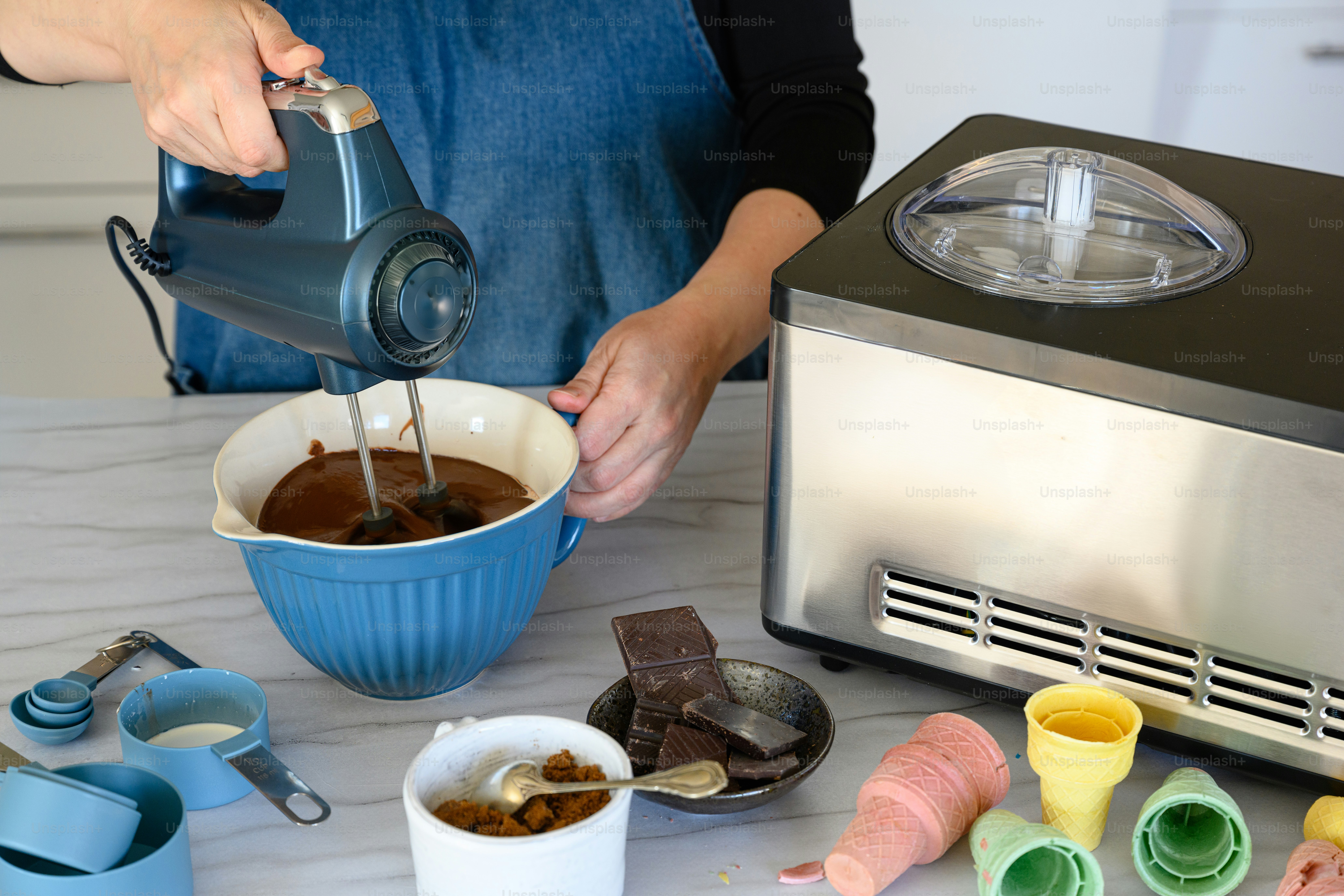 a person pouring chocolate into a bowl