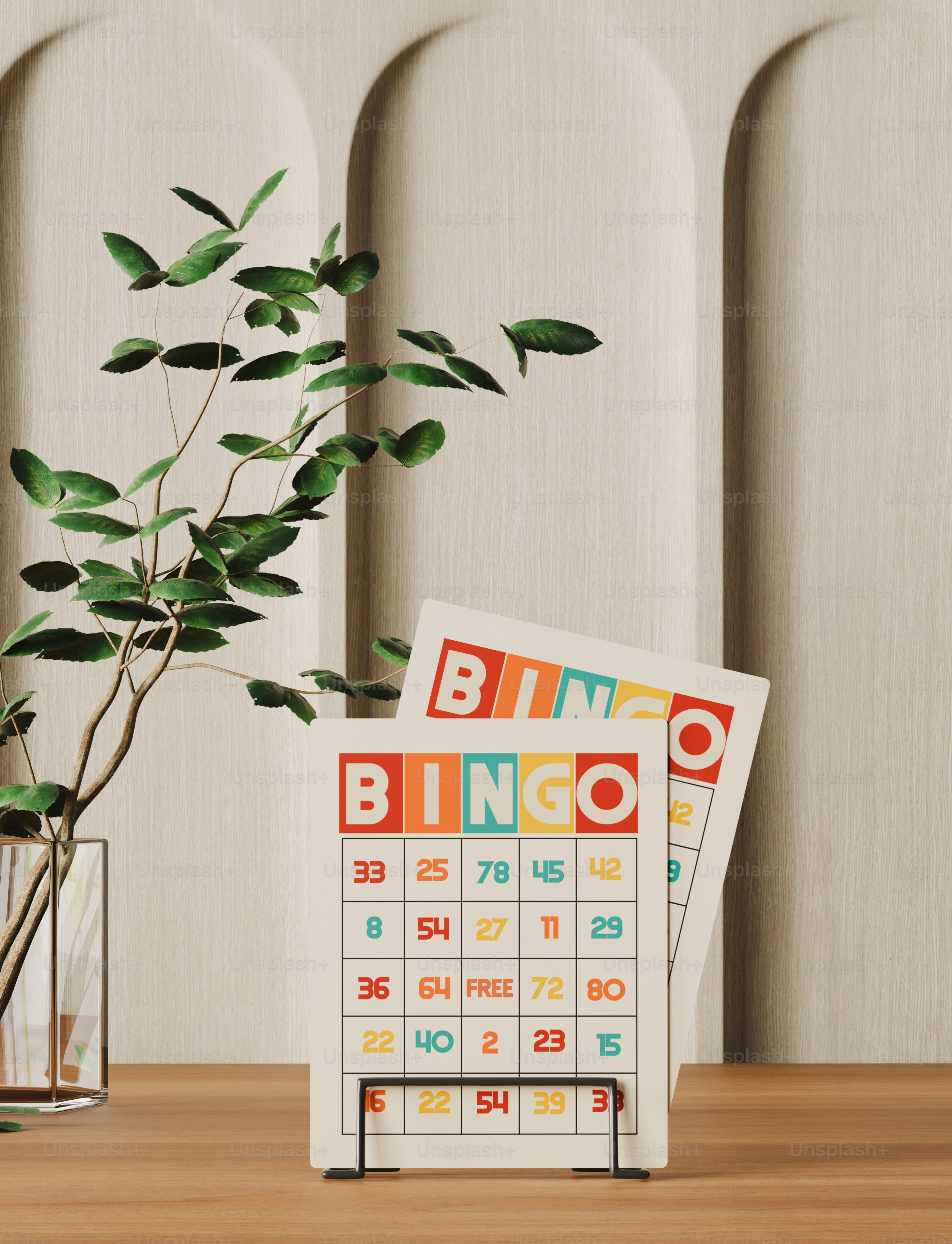 a table topped with a plant and a calendar