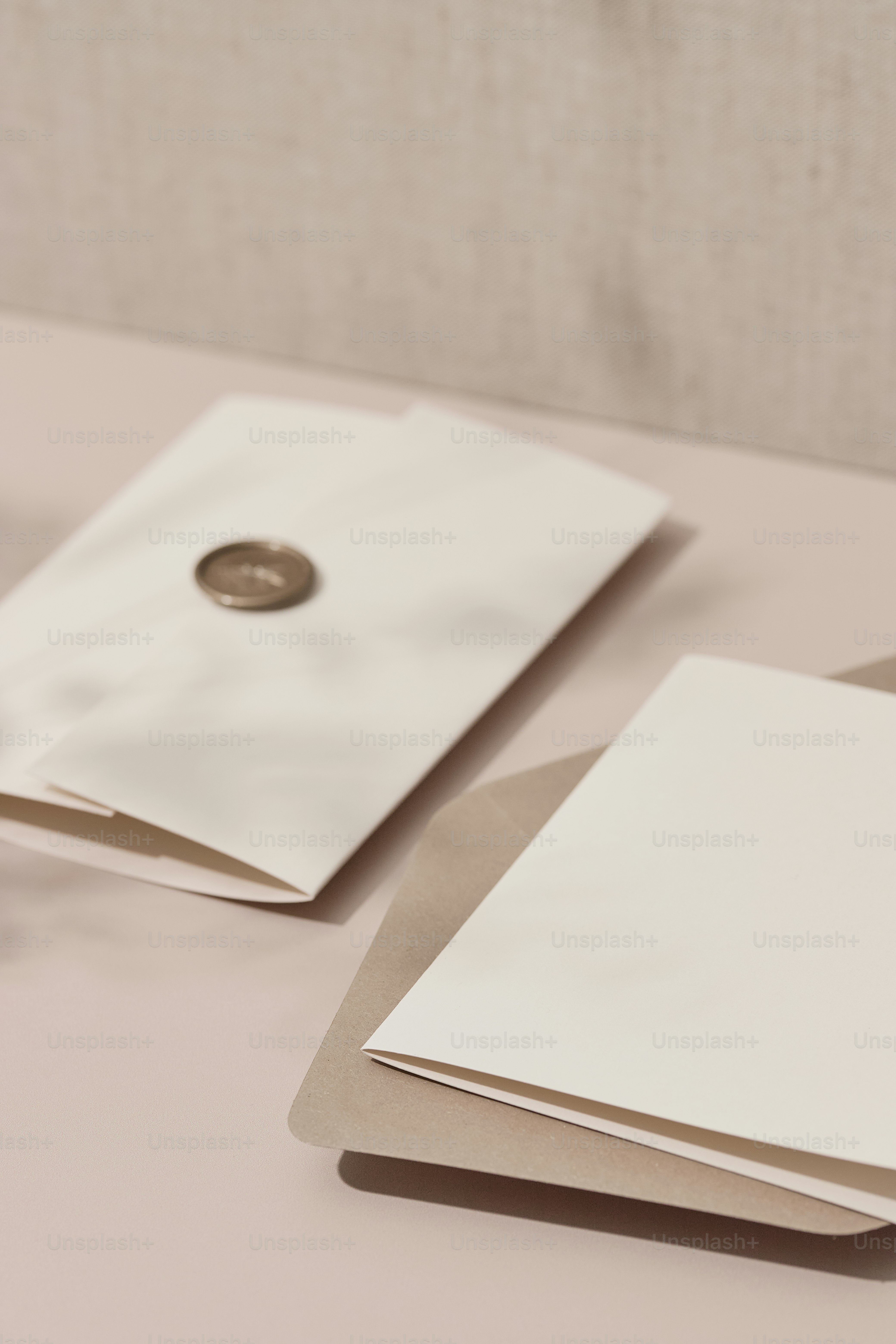 a close up of a table with papers and a cup of coffee