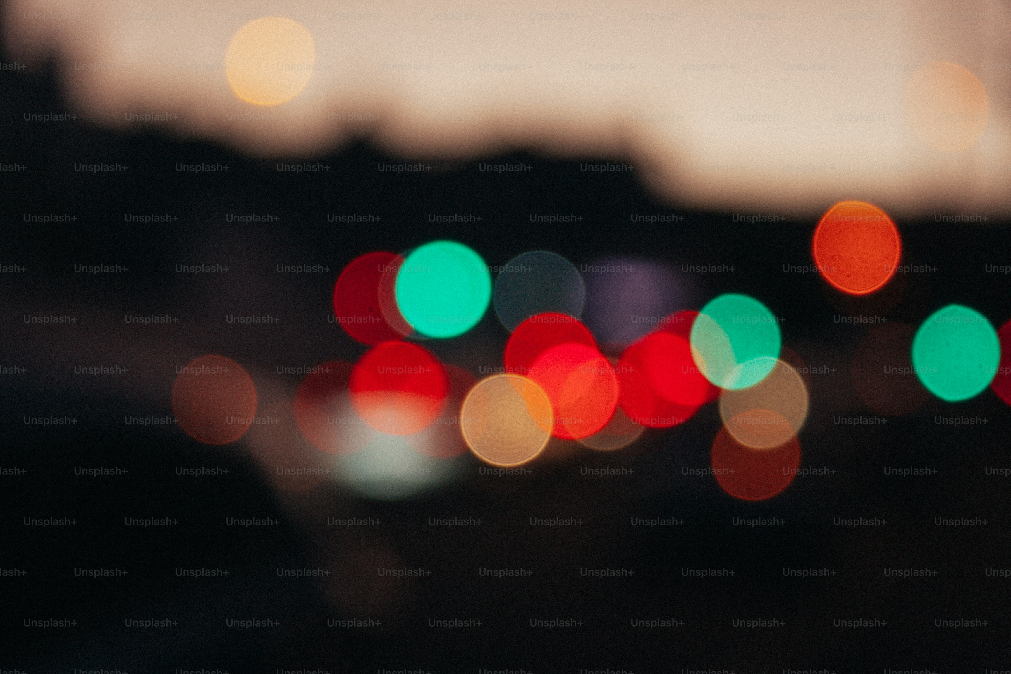 a blurry photo of a city street at night