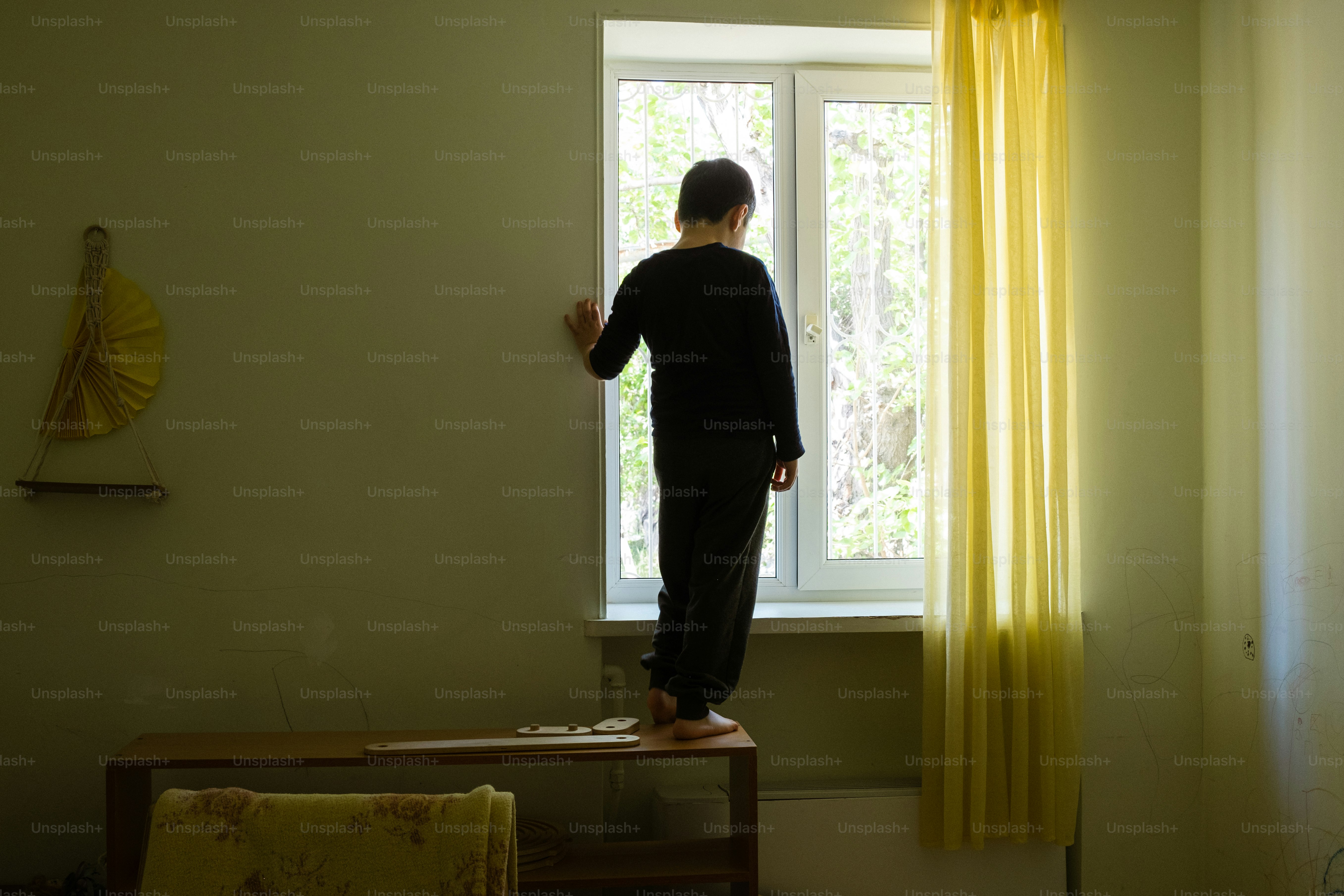 a person standing in front of a window