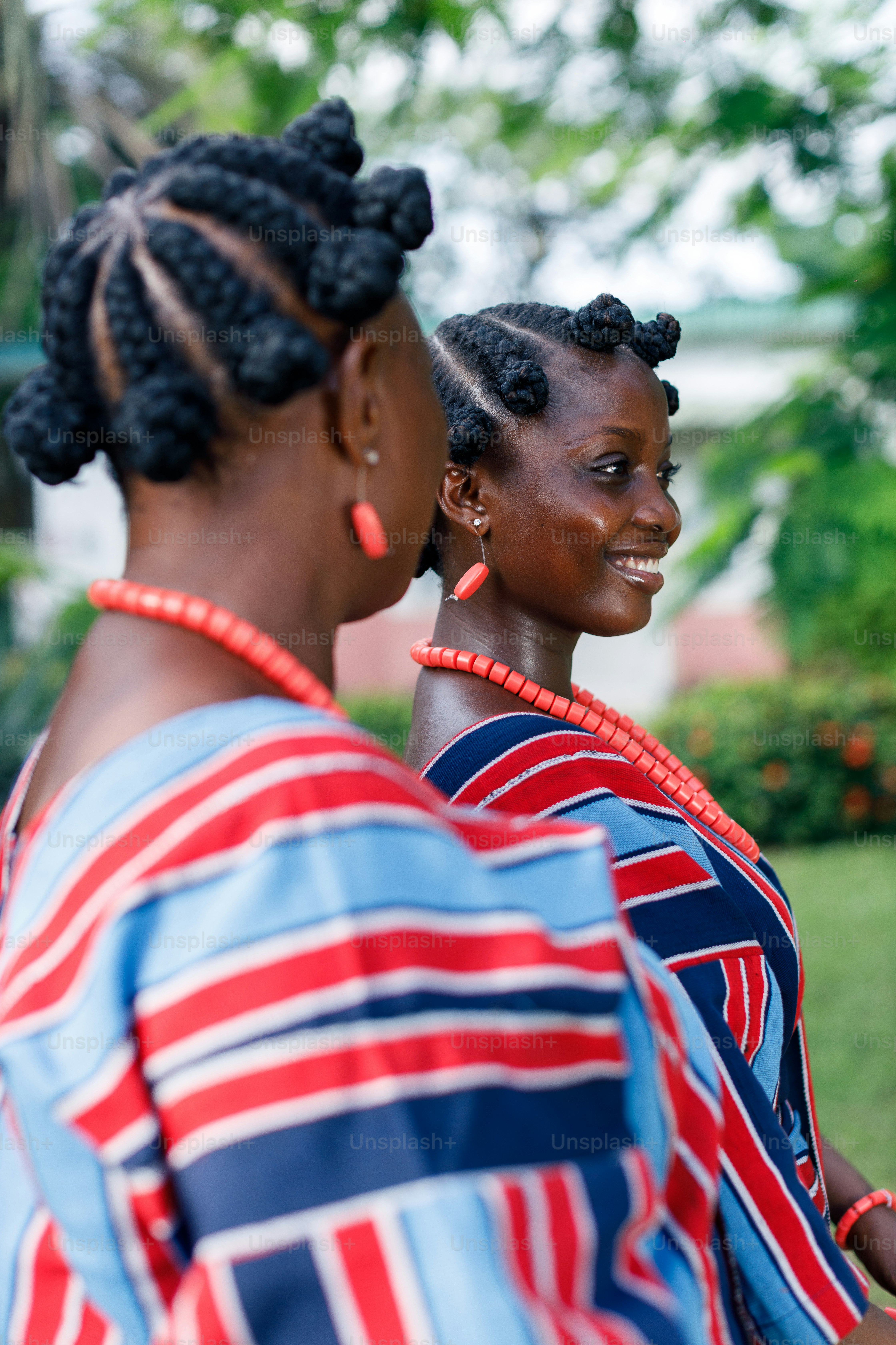 a couple of women standing next to each other