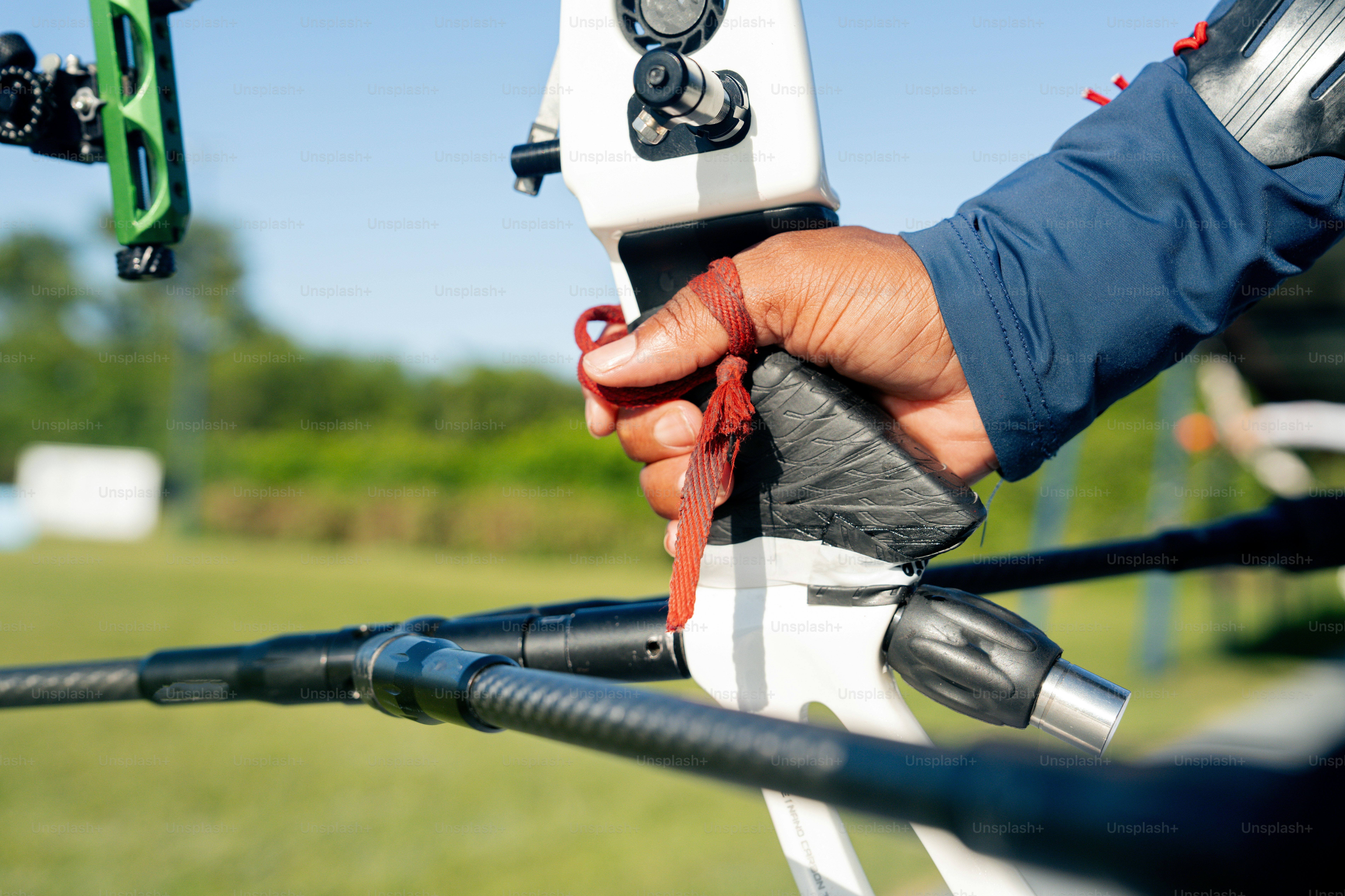a person holding a pair of scissors in their hand