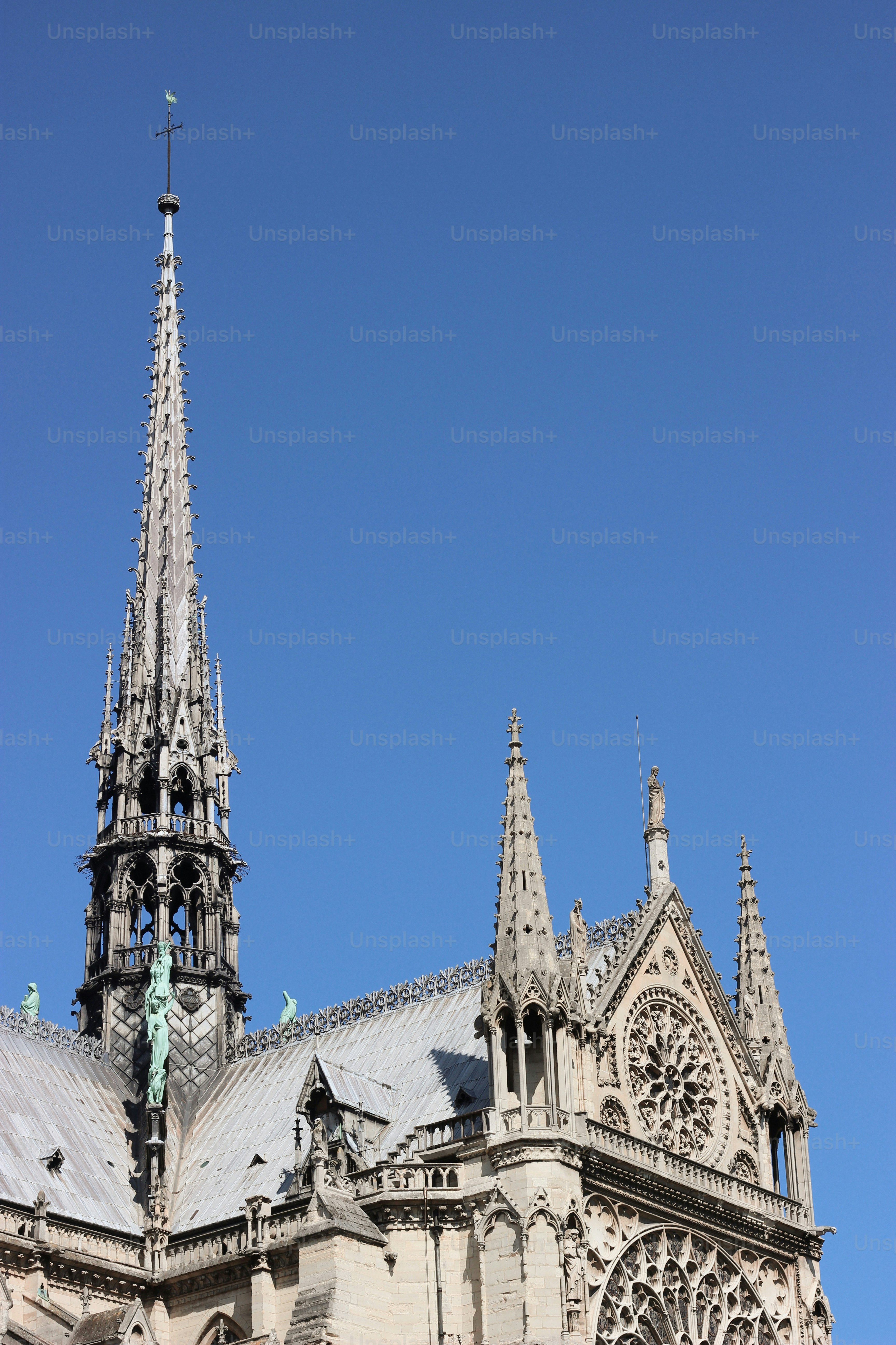 A large cathedral with a steeple on a clear day