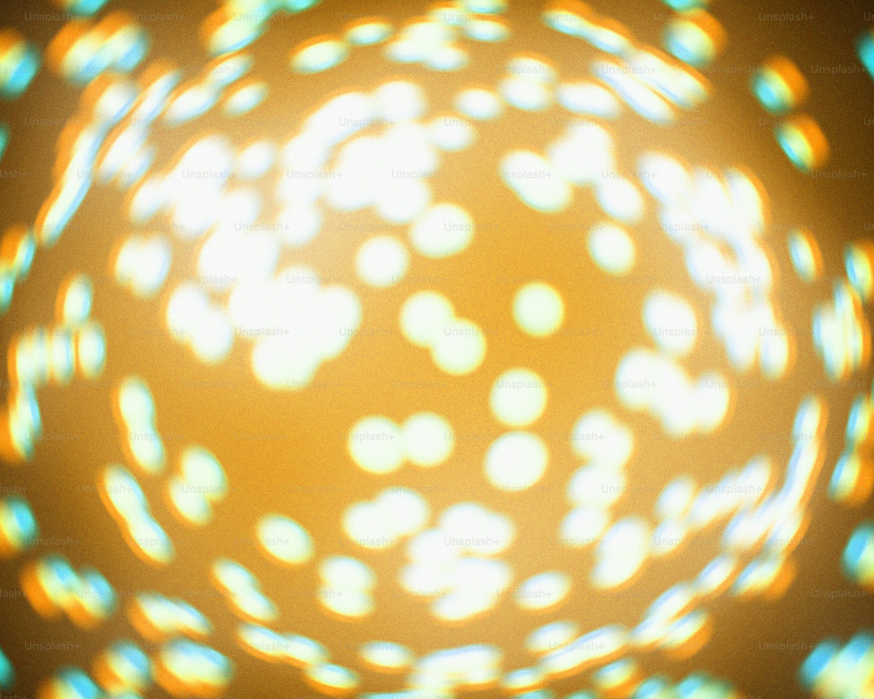 a close up of a circular object with a yellow background