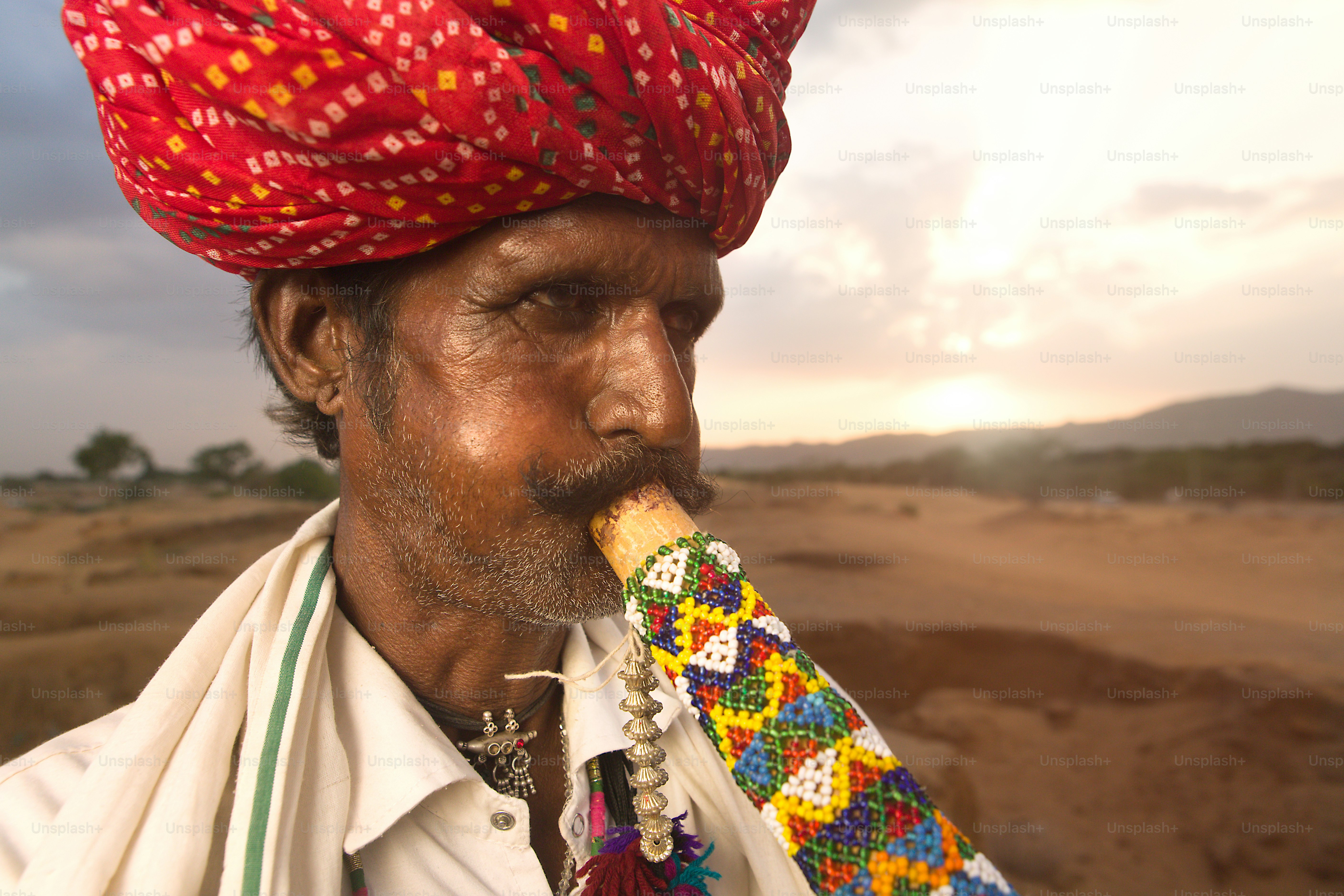 A woman in a colorful dress is dancing photo – India Image on Unsplash