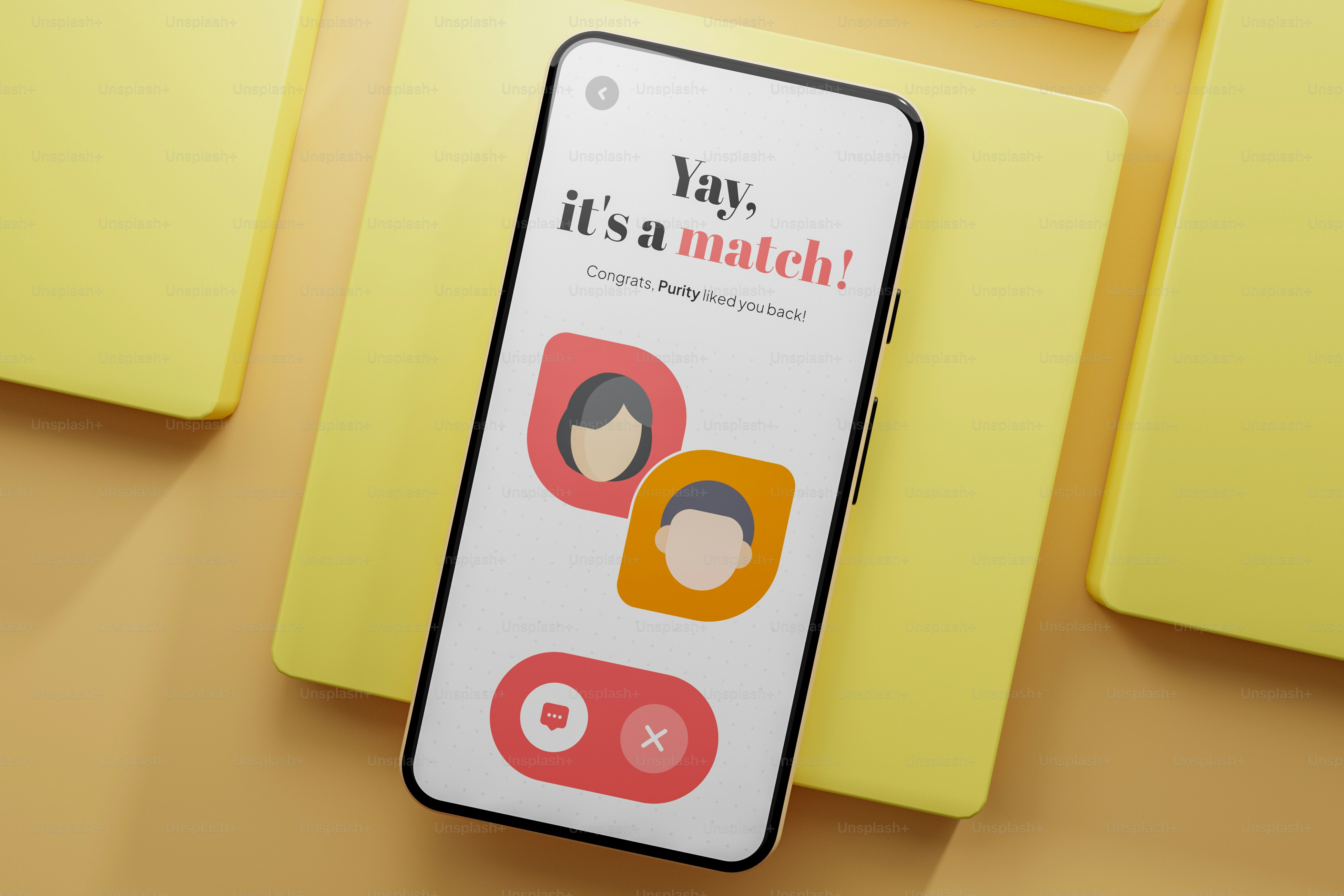 Ein Handy sitzt auf einer gelben Oberfläche