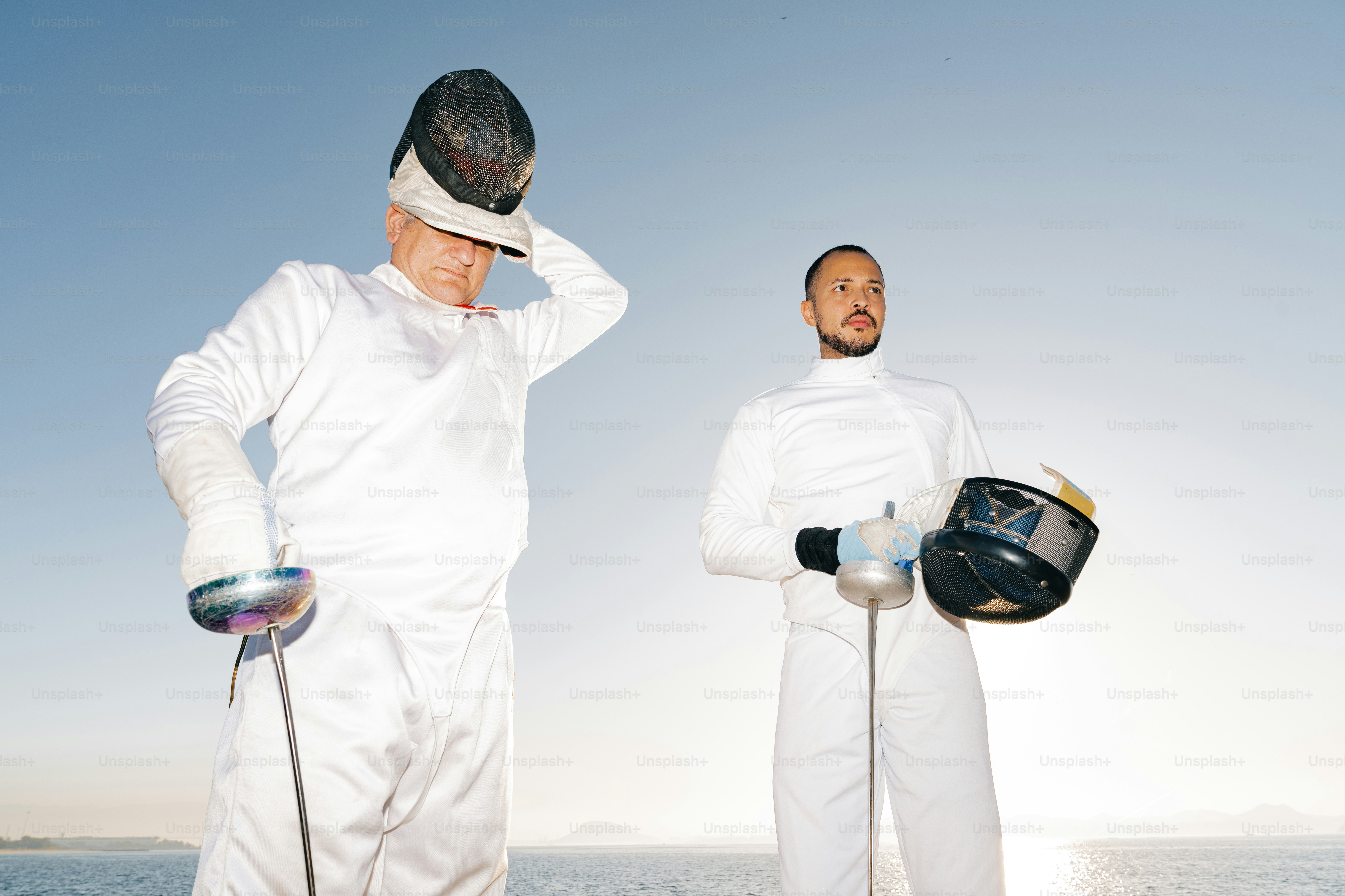 A couple of men standing next to each other