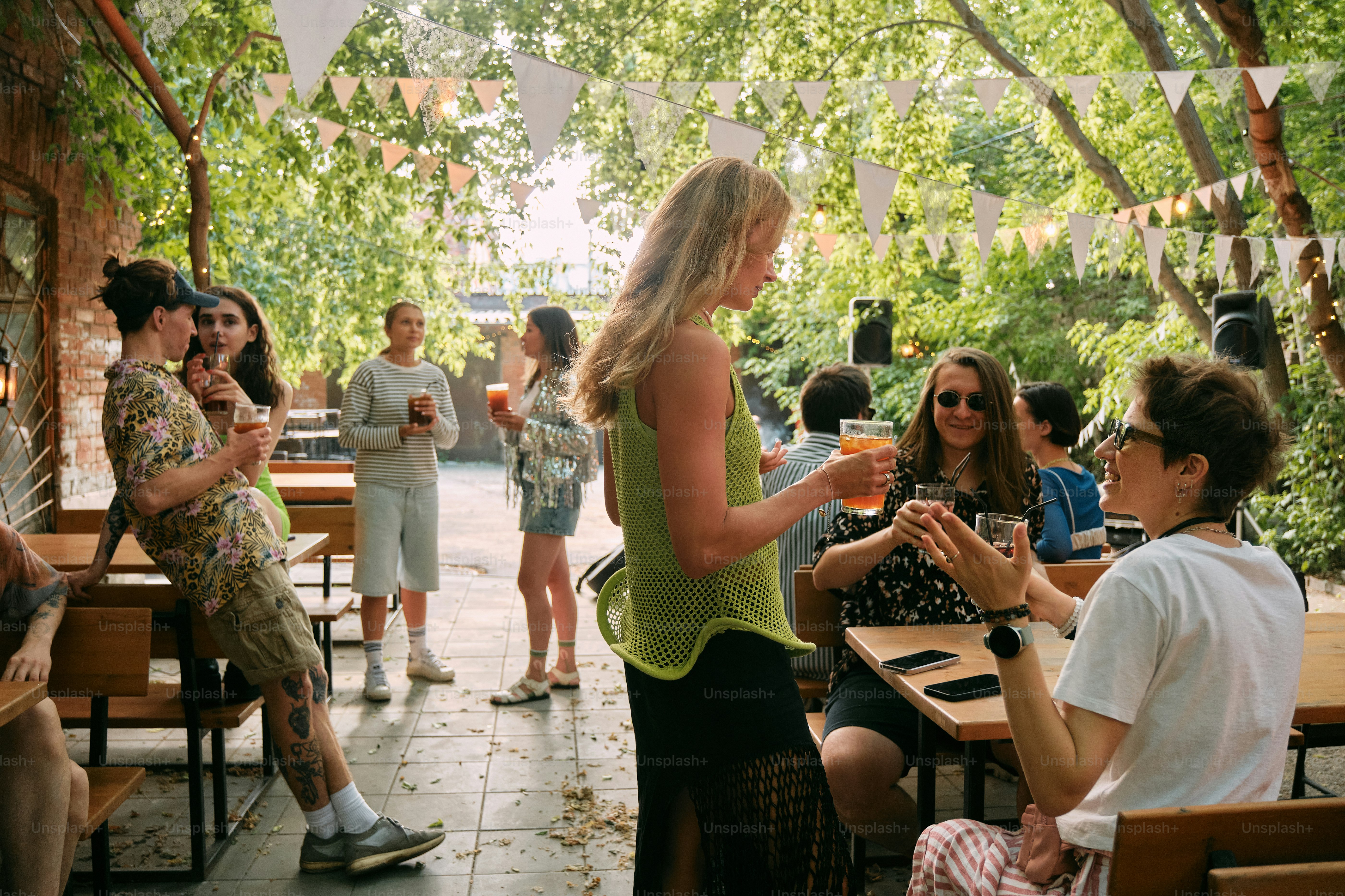 A group of people sitting around a wooden table