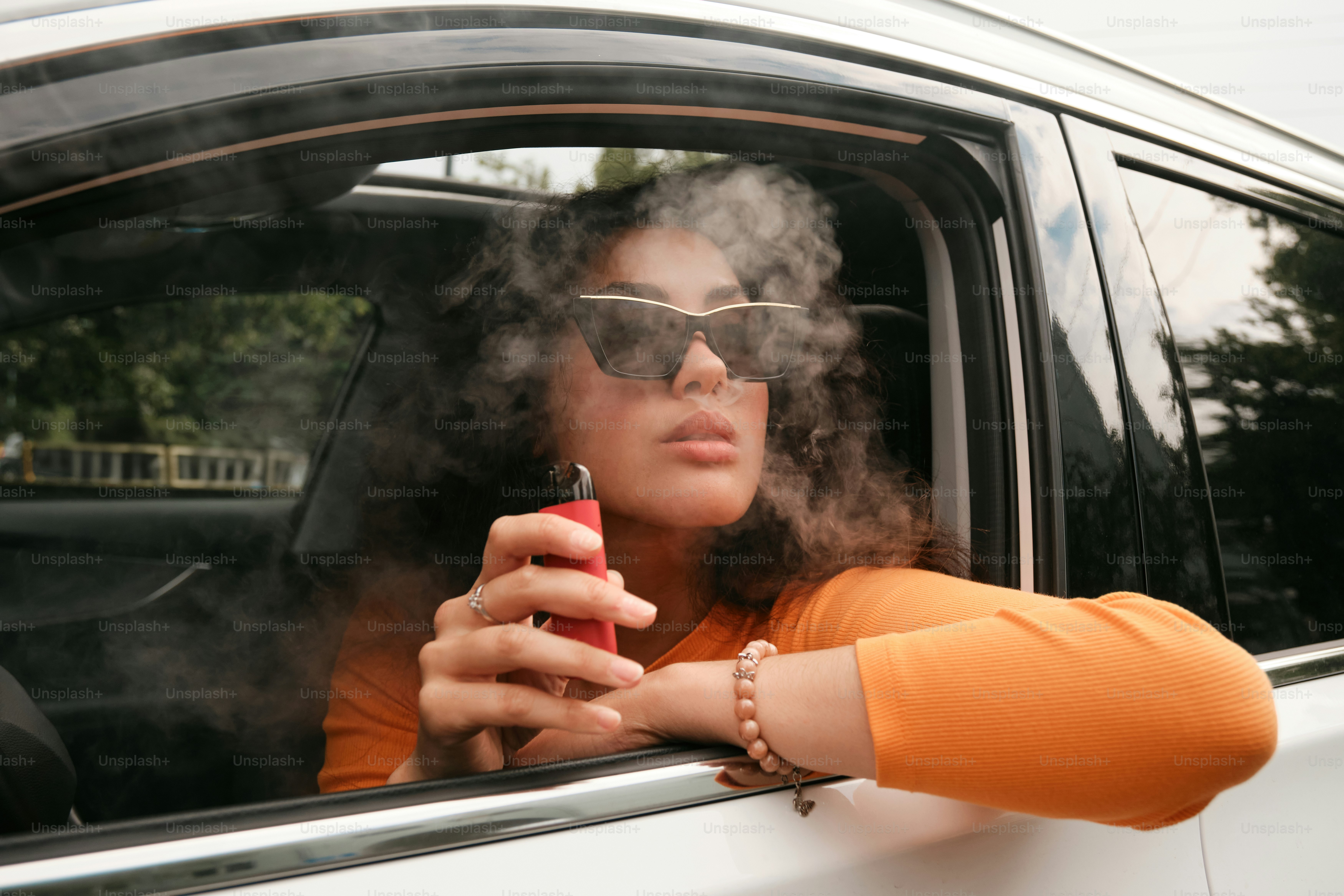 portrait of a vaping woman