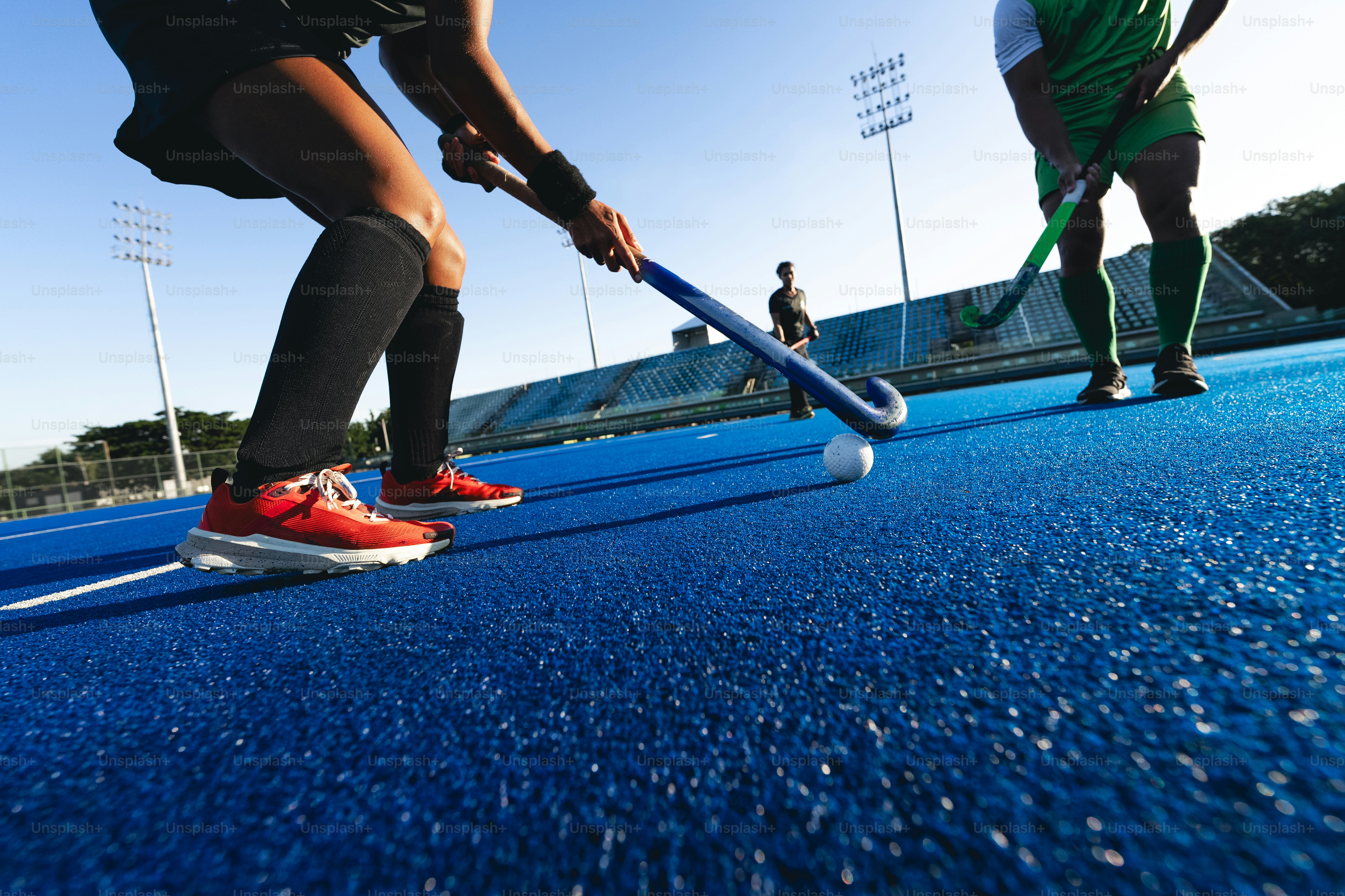 A couple of men standing on top of a tennis court