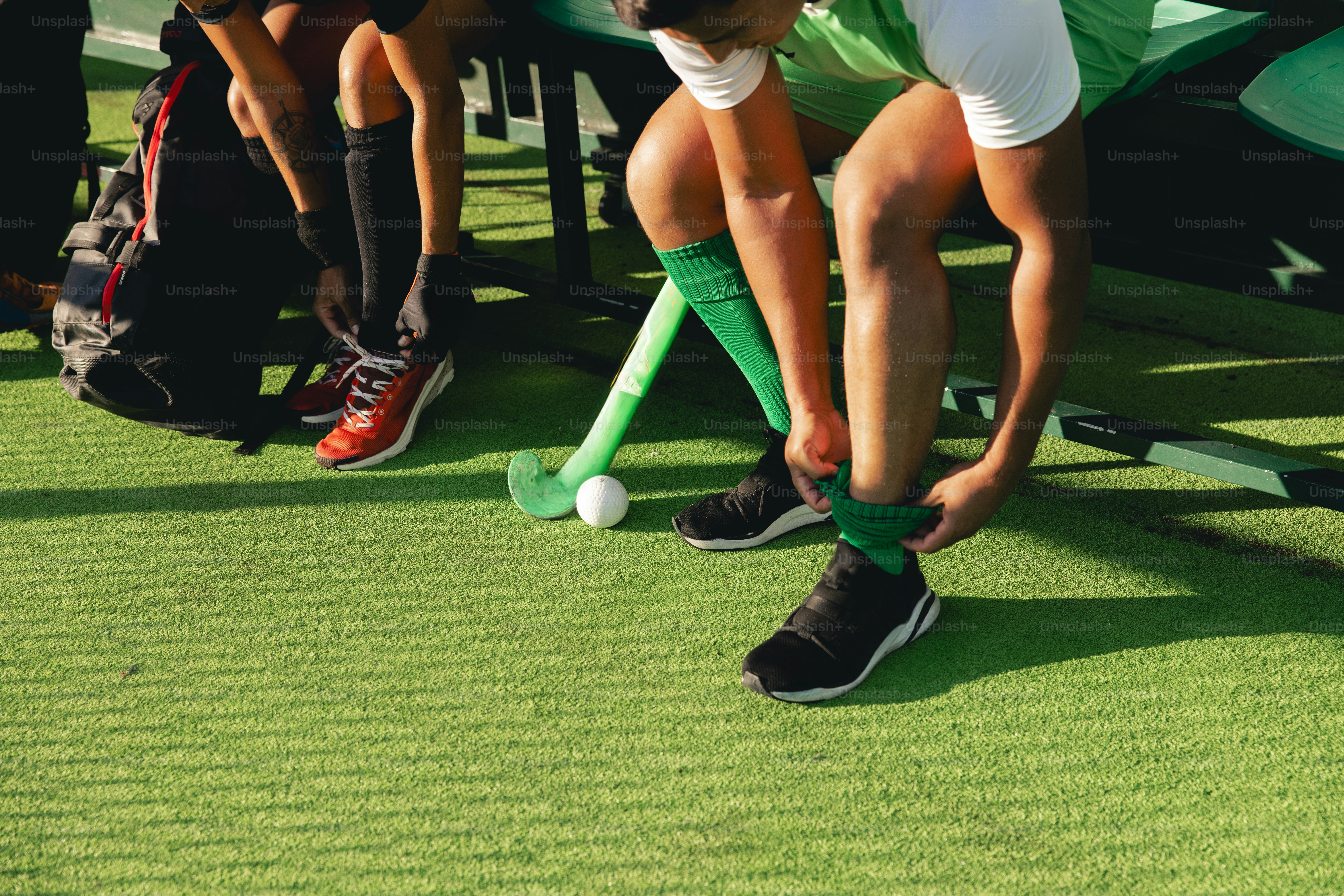 A group of people playing a game of mini golf