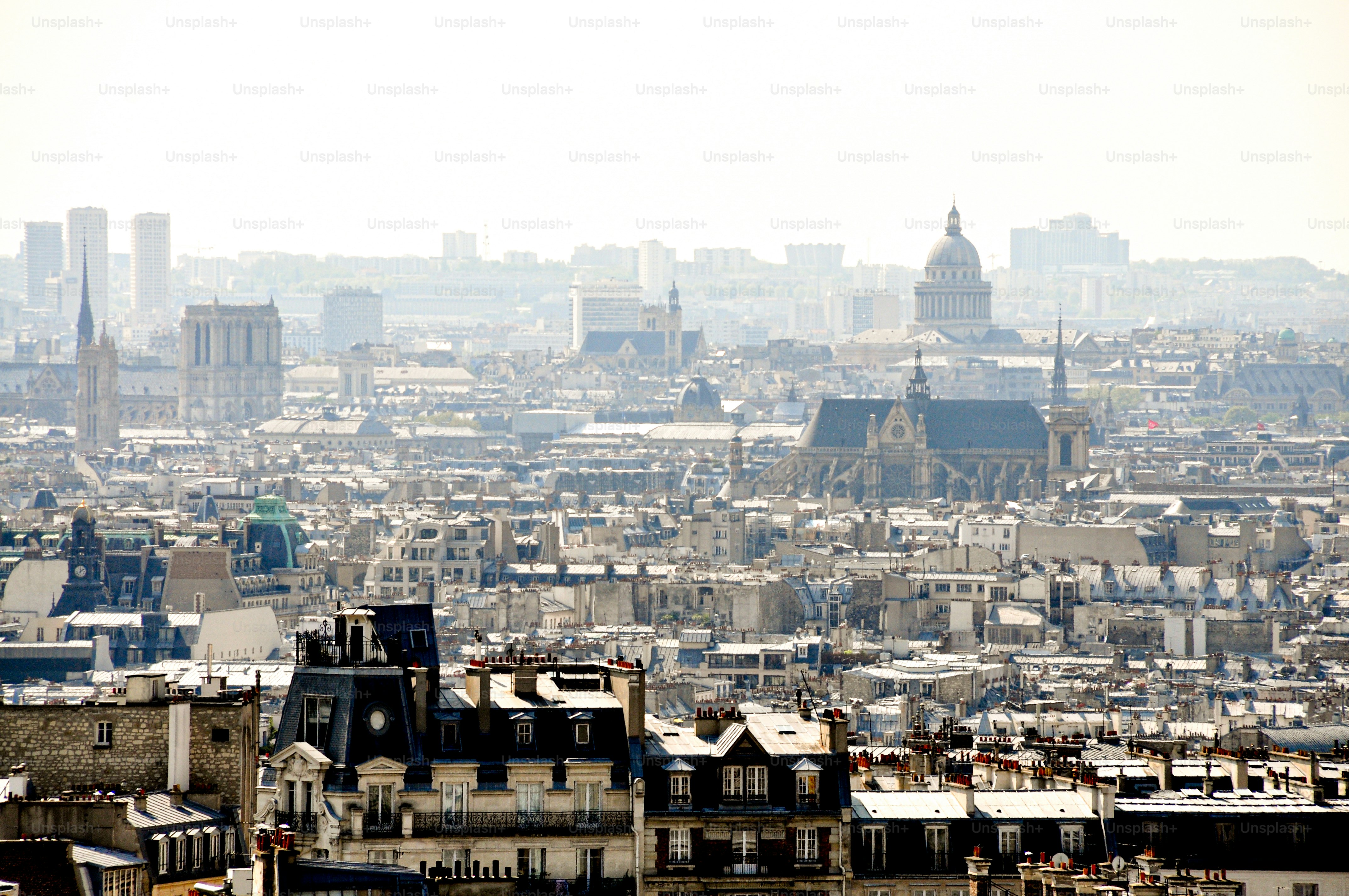 A view of a city from the top of a building