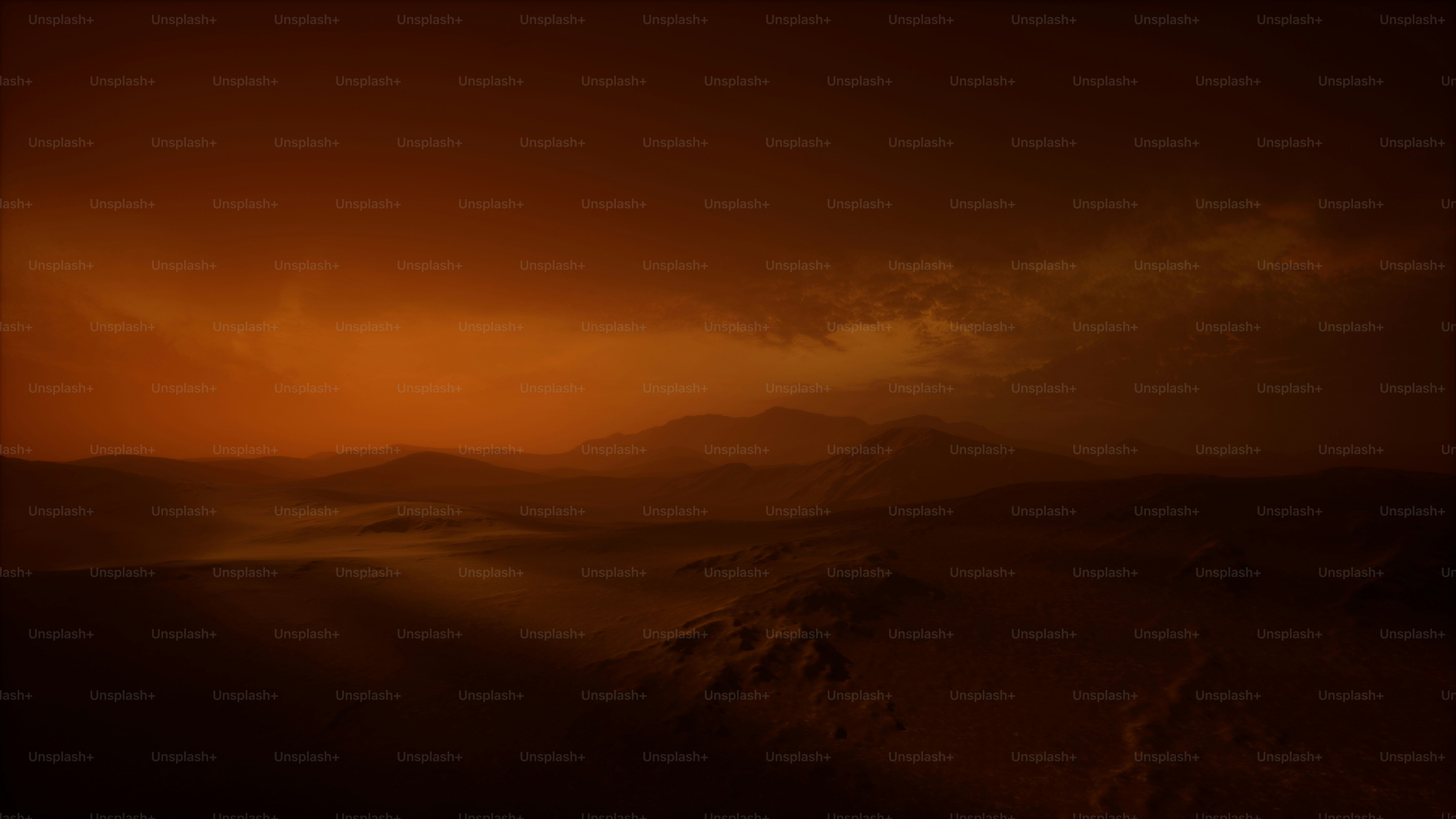 A picture of a sunset taken from a plane