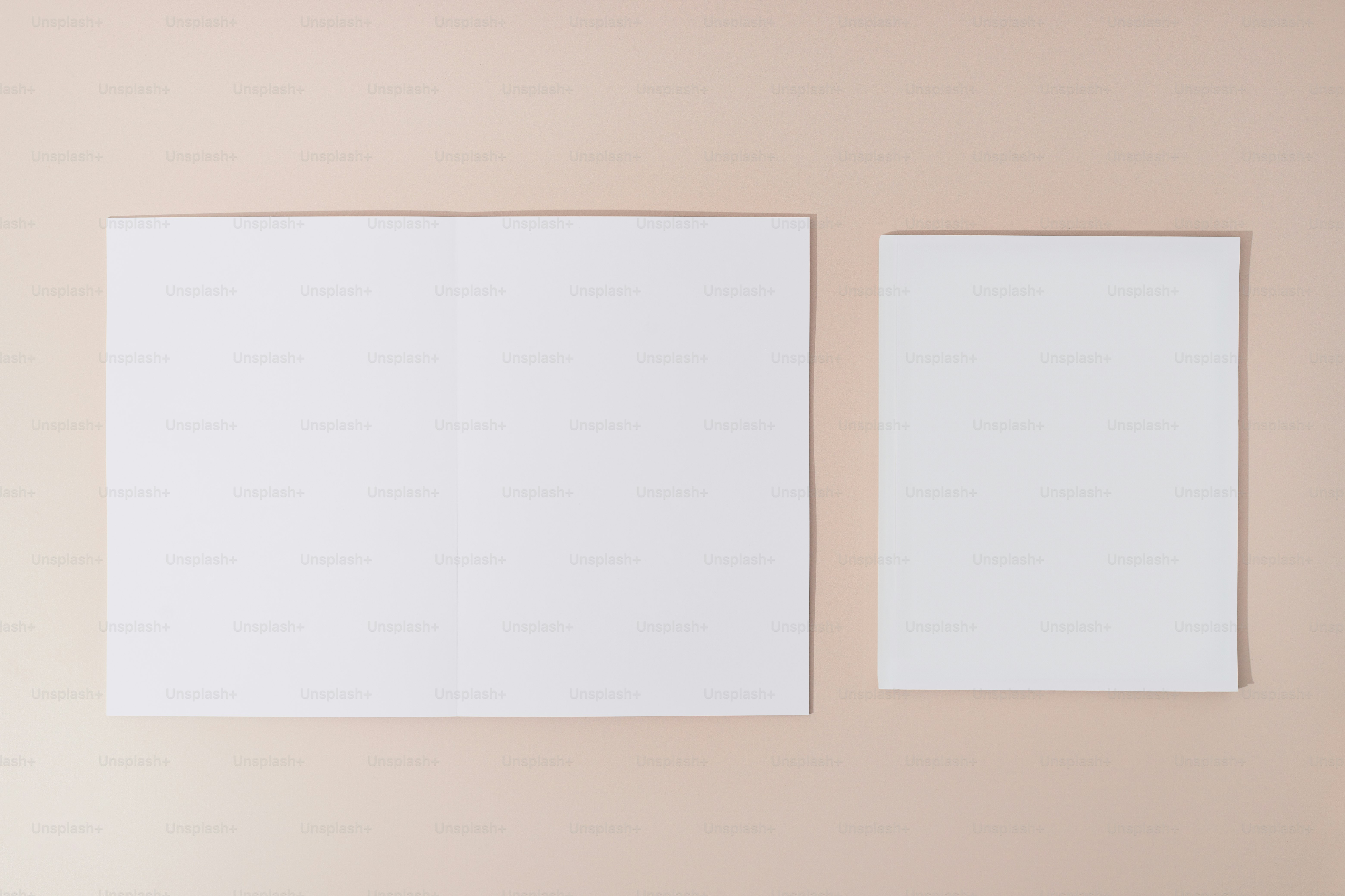 A bedroom with a bed and two pictures on the wall