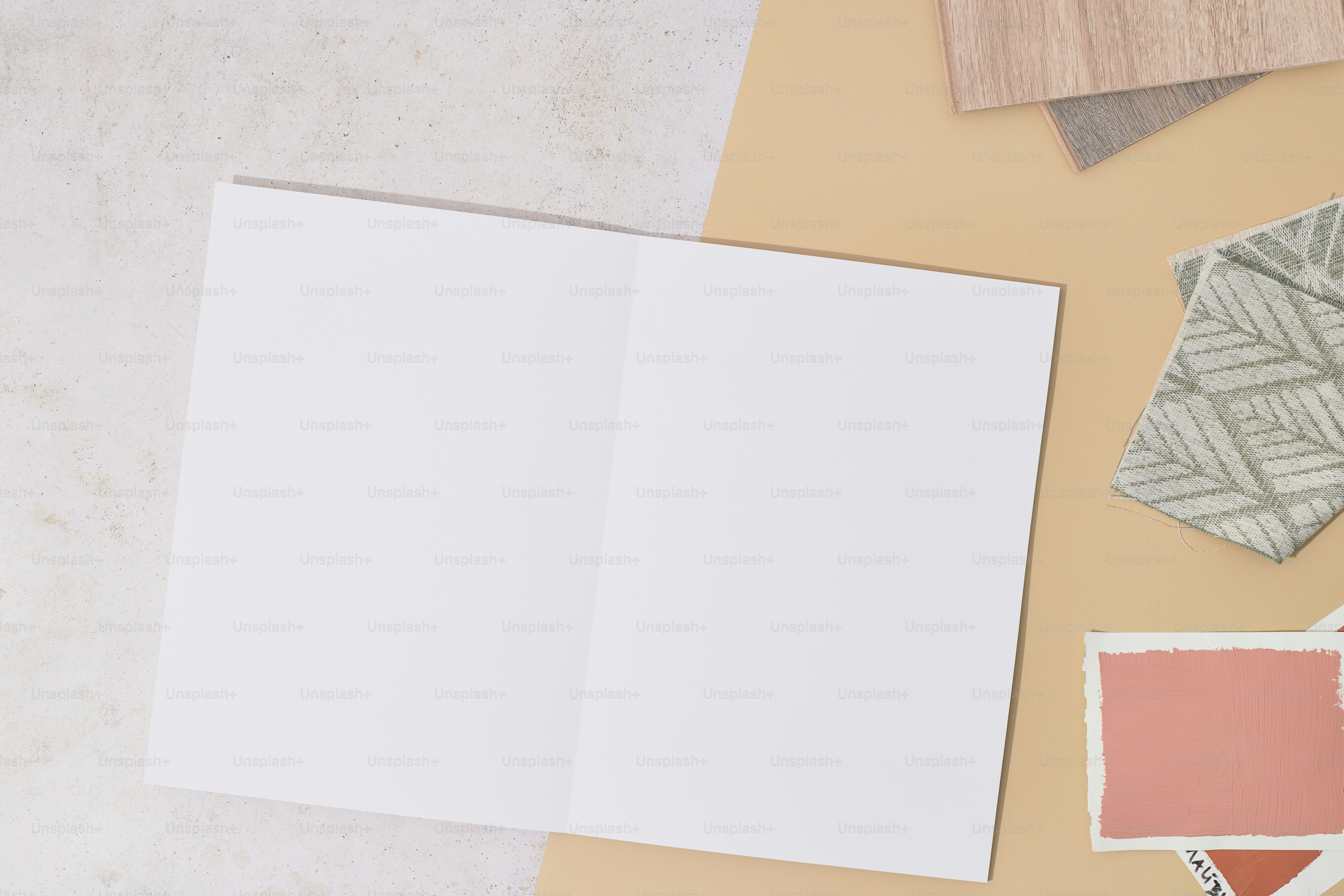 A table topped with lots of different types of paper