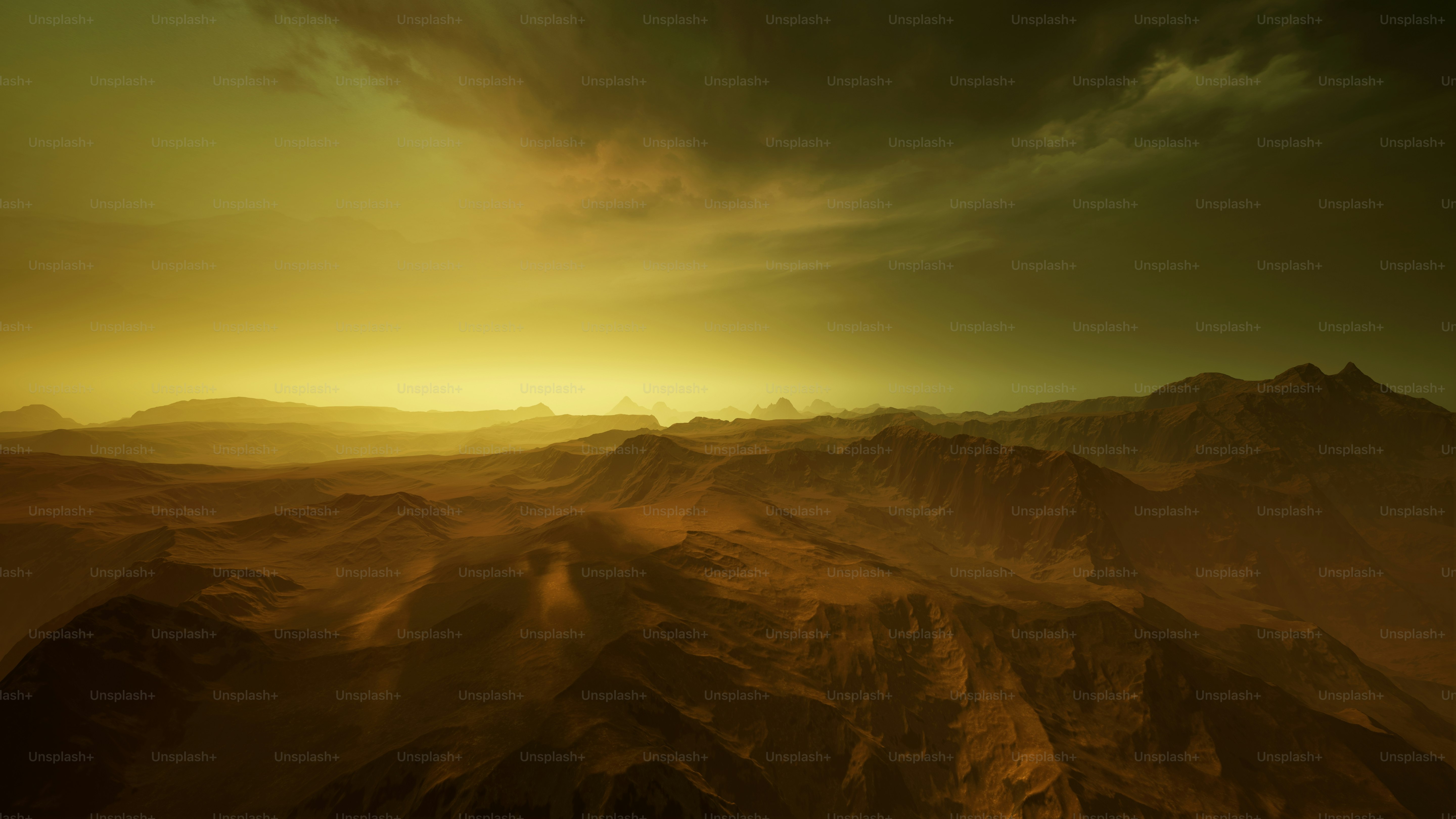 The sun is setting over a mountain range