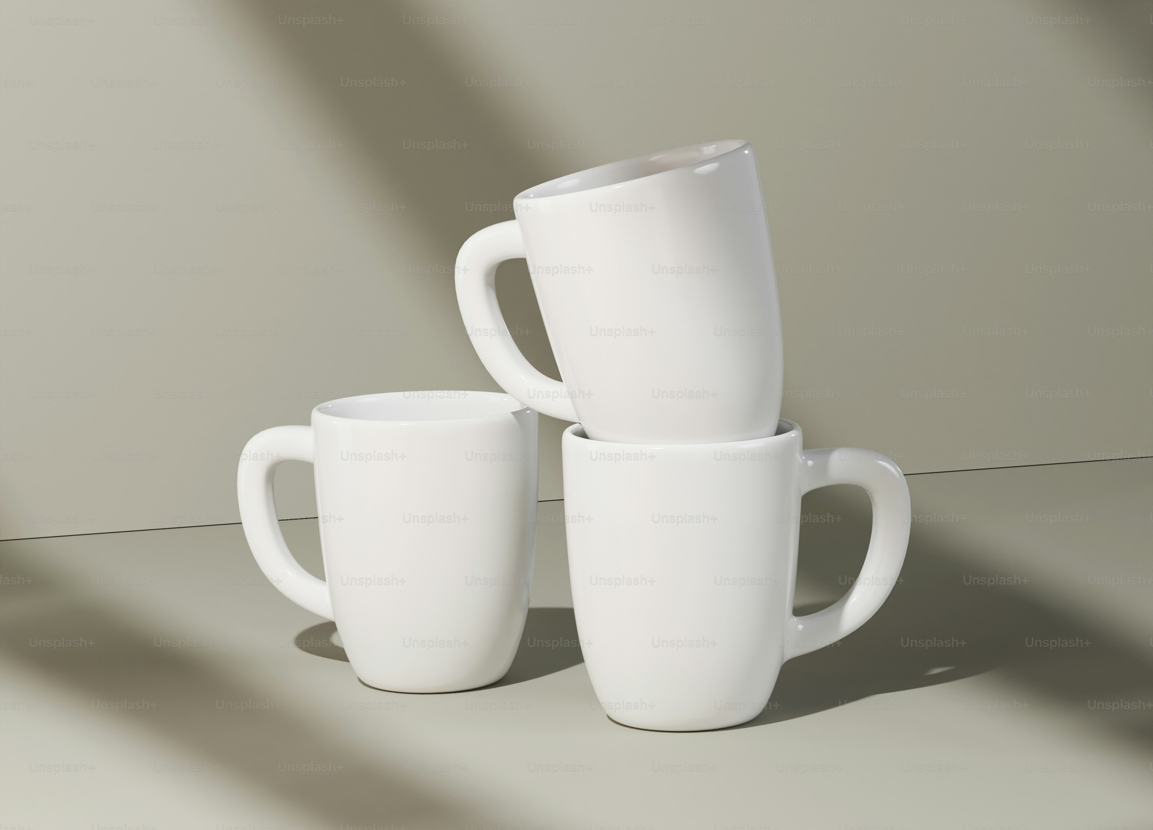 A stack of white coffee cups sitting on top of a table