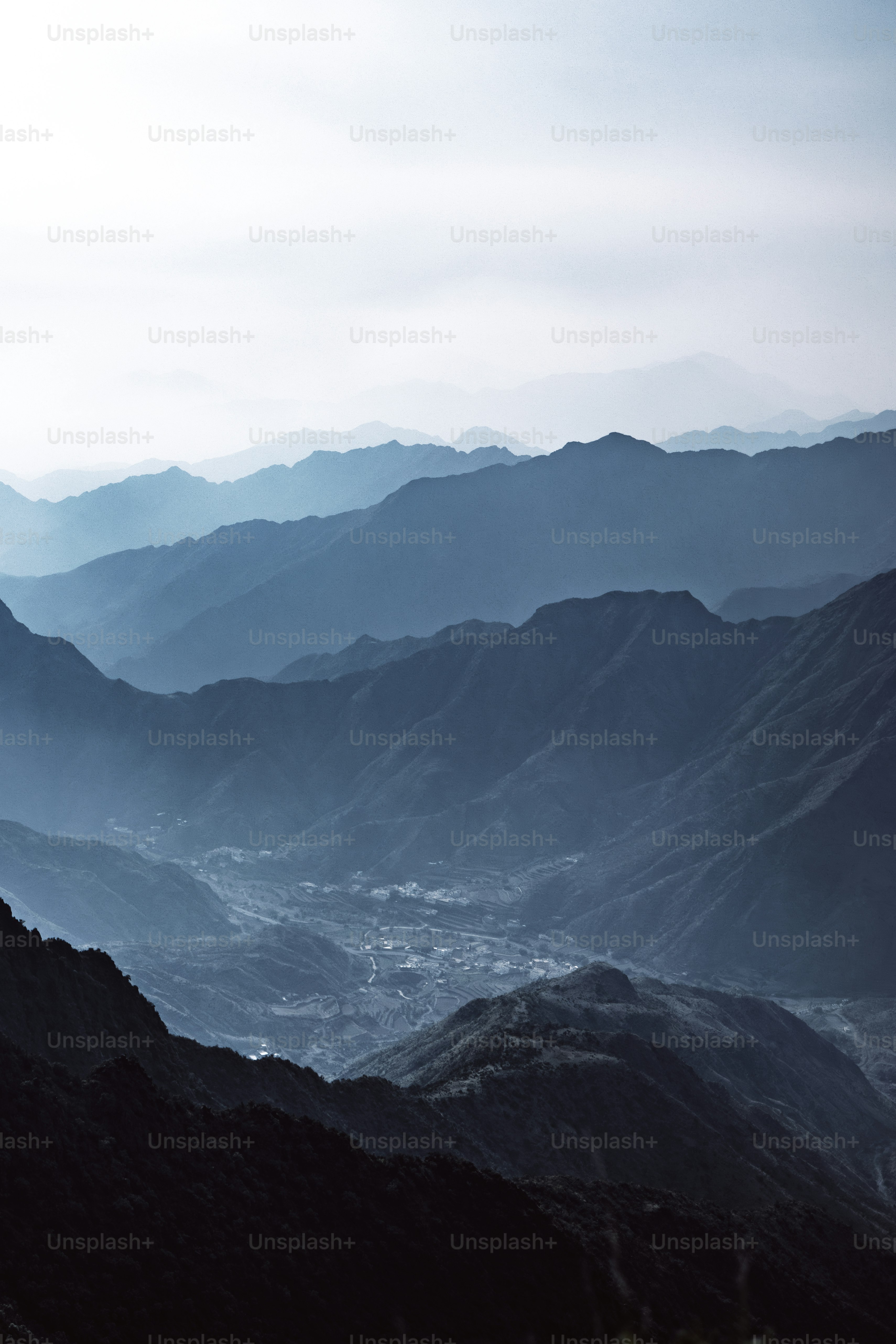 A person standing on top of a mountain