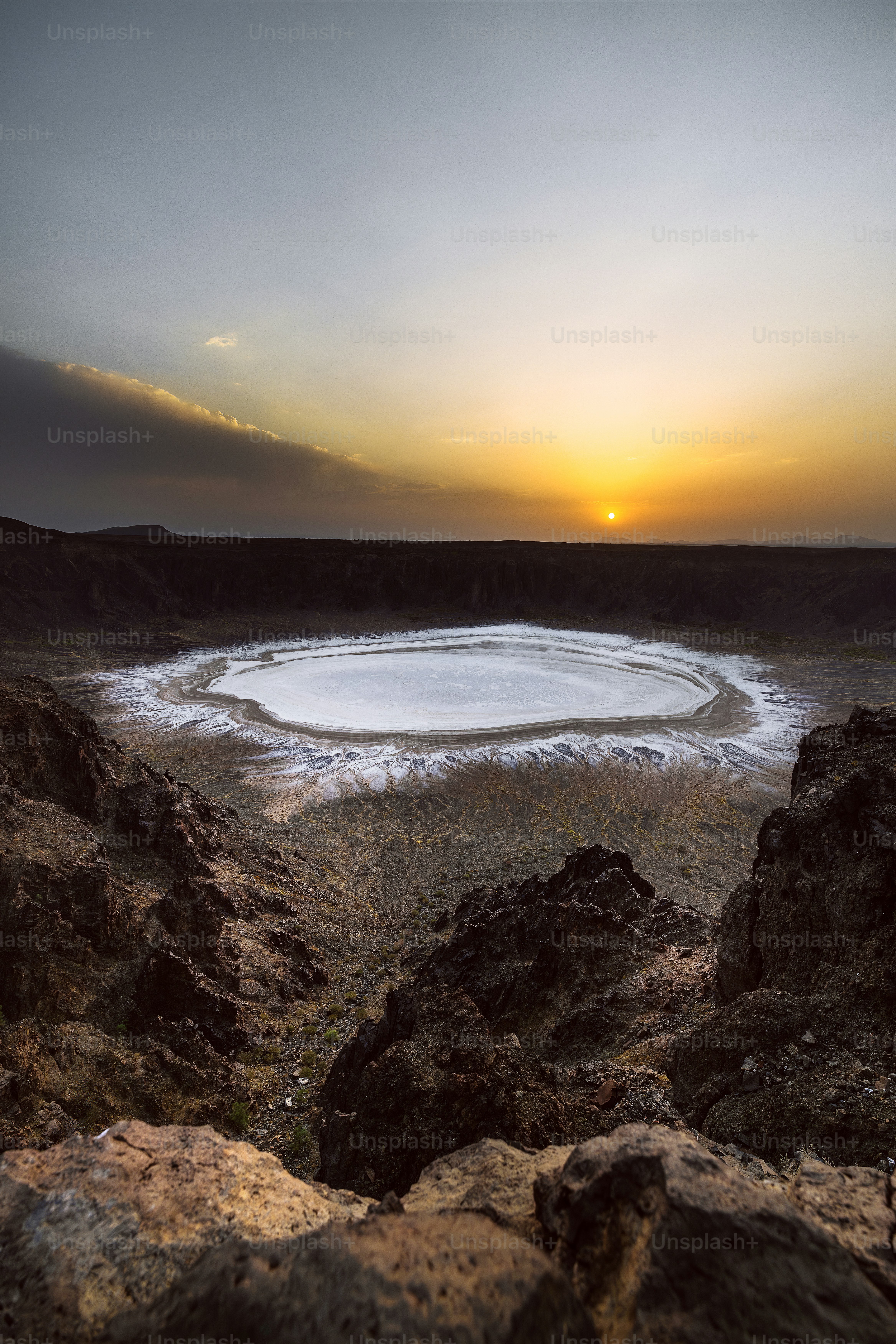 The sun is setting over a body of water