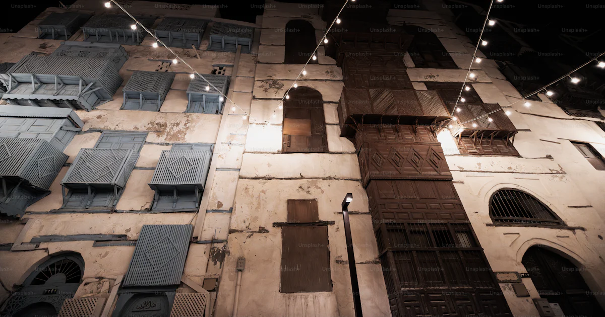Building With String A tall building with a string of lights hanging from it's side photo ...