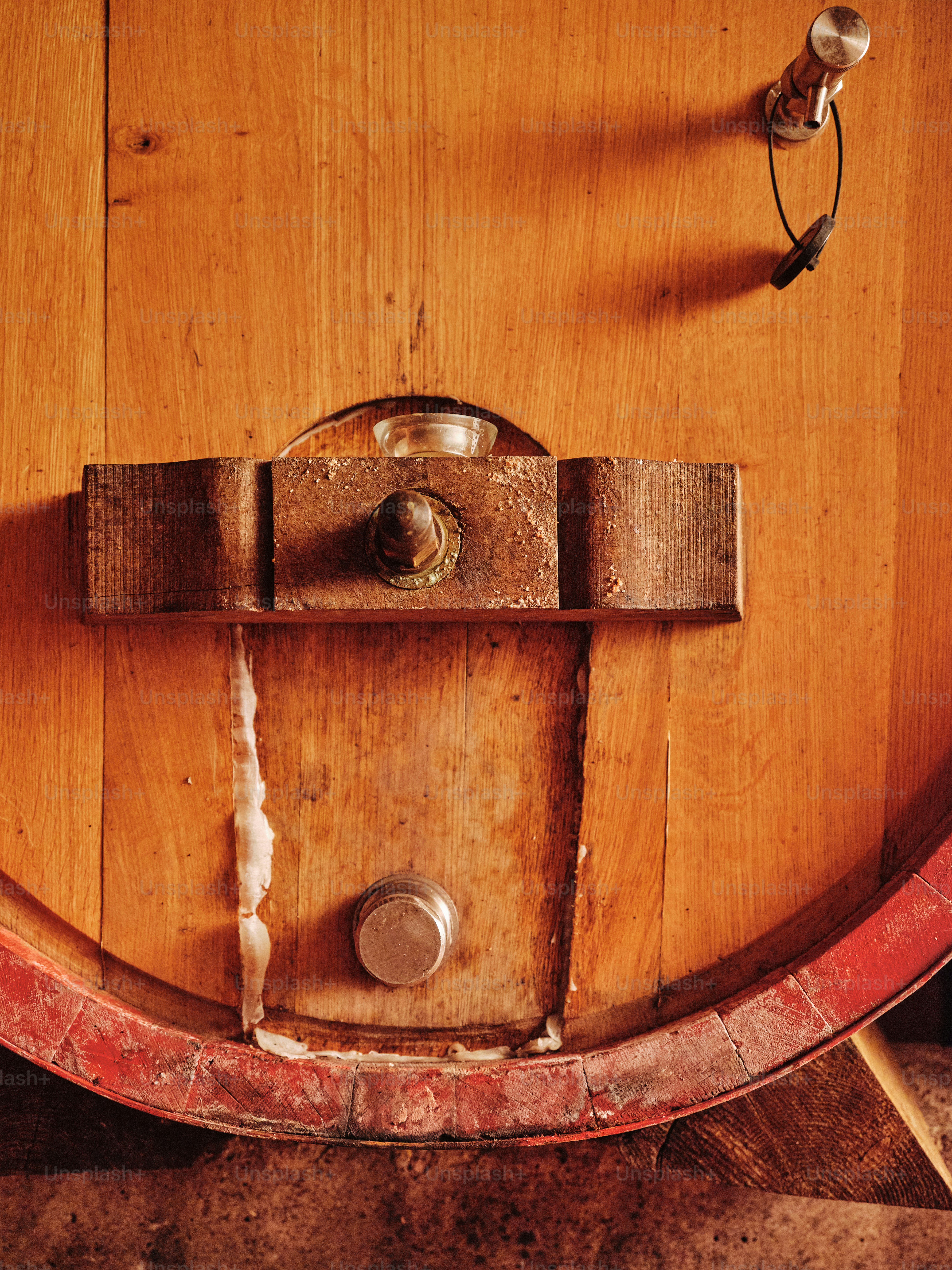 A close up of a wooden barrel with a latch