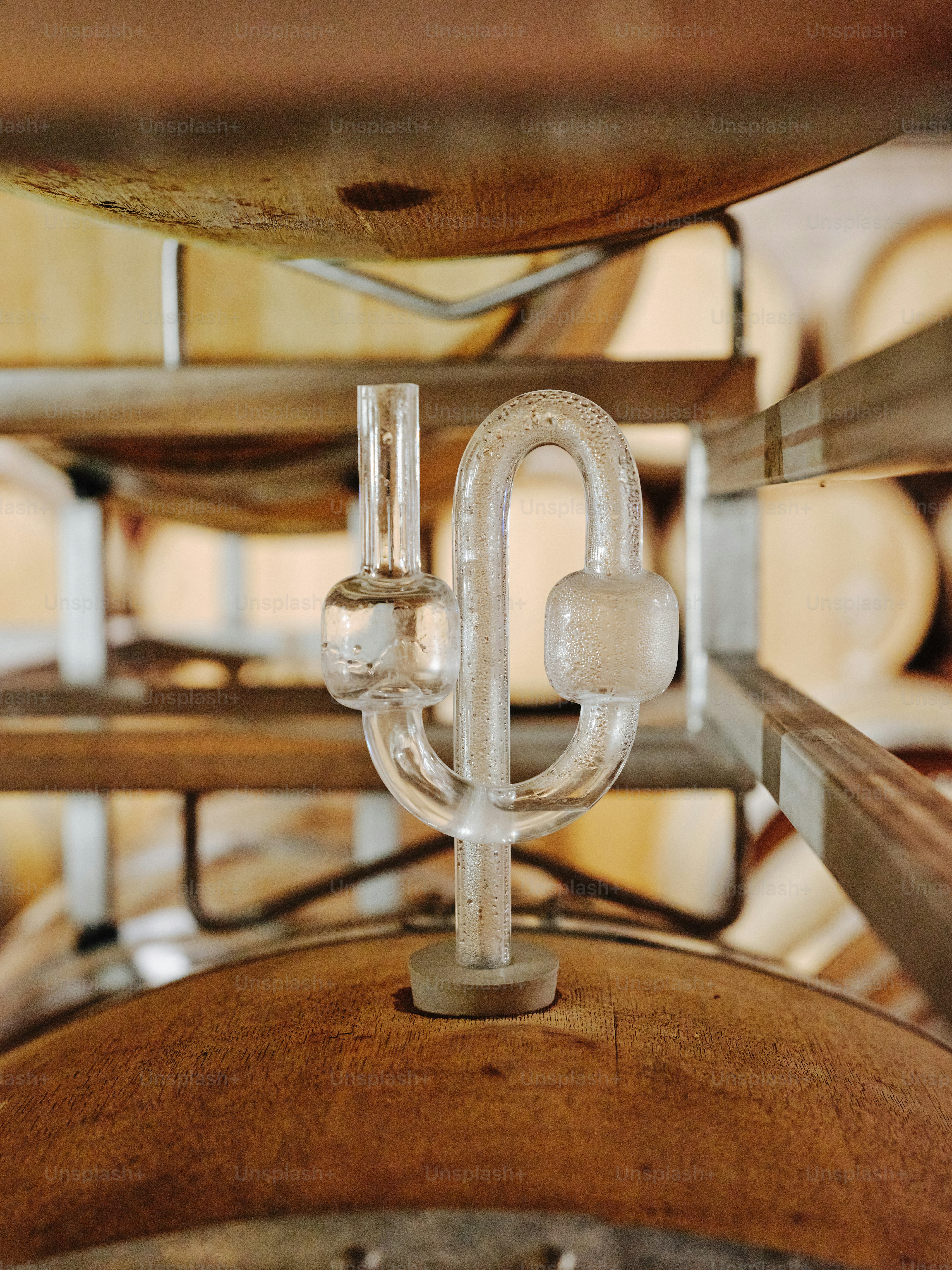 A close up of a bunch of wine barrels
