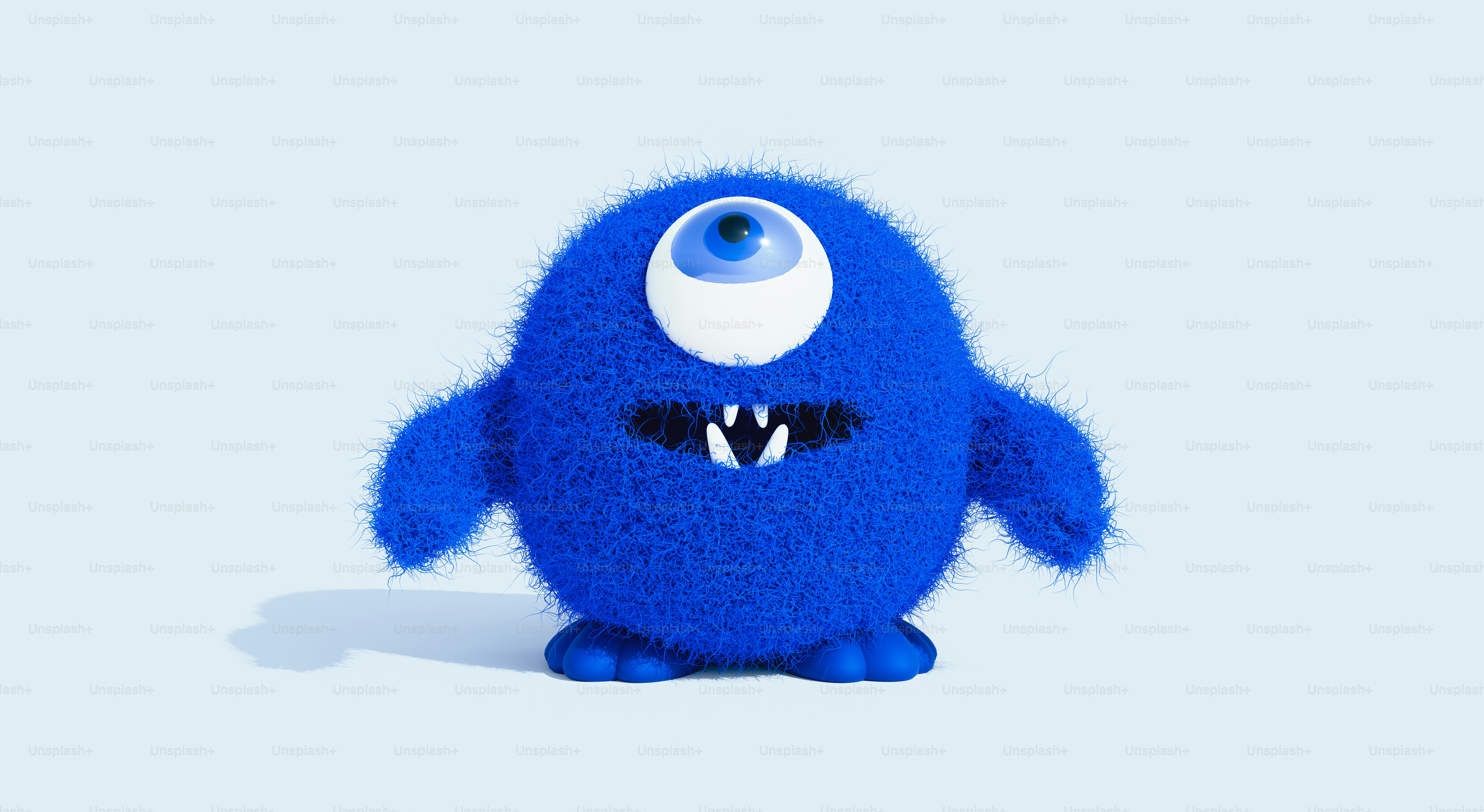 Ein blaues Stofftier mit großen Augen