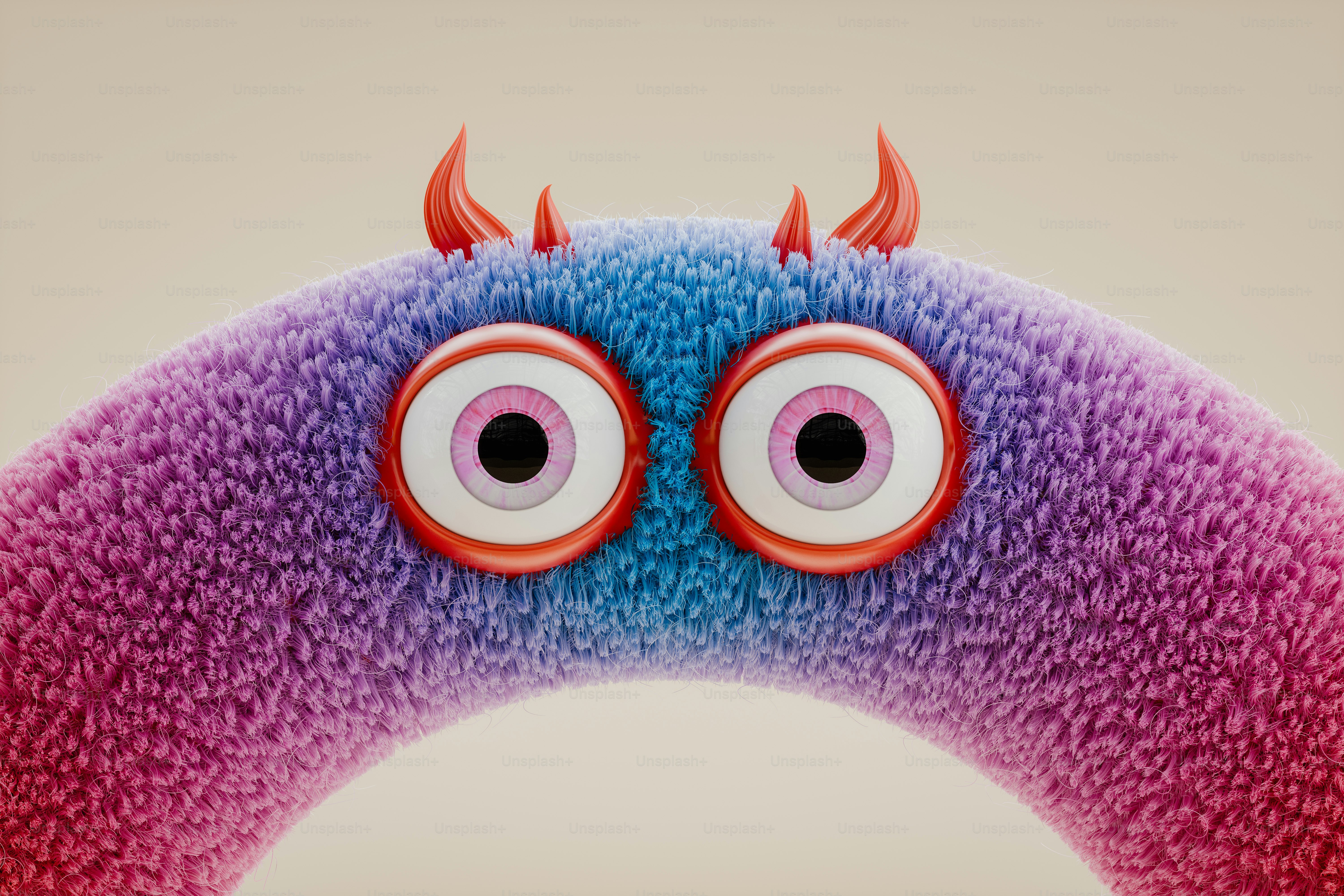 A close up of a stuffed animal with big eyes