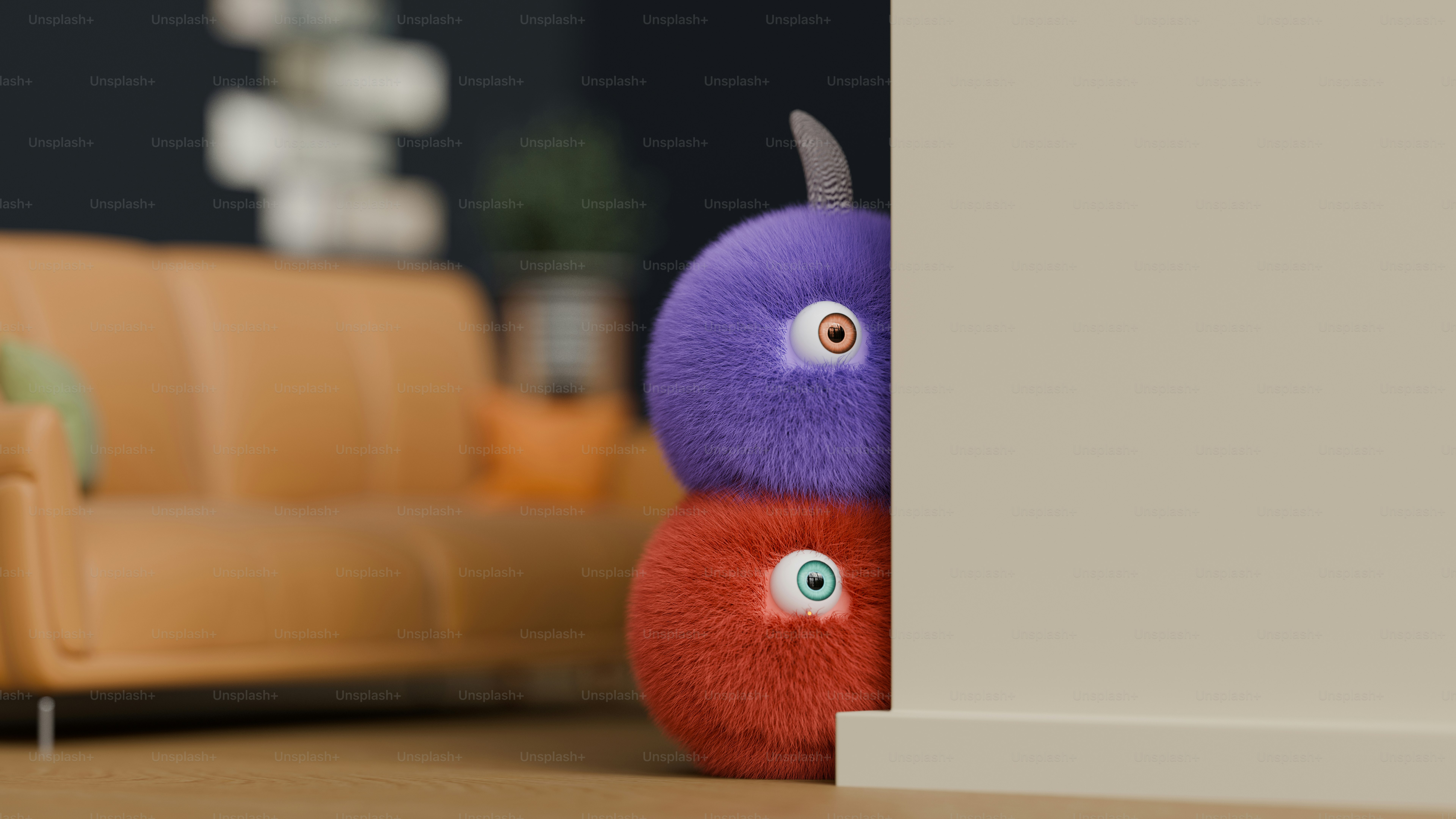 A purple and red stuffed animal sitting on top of a wooden floor