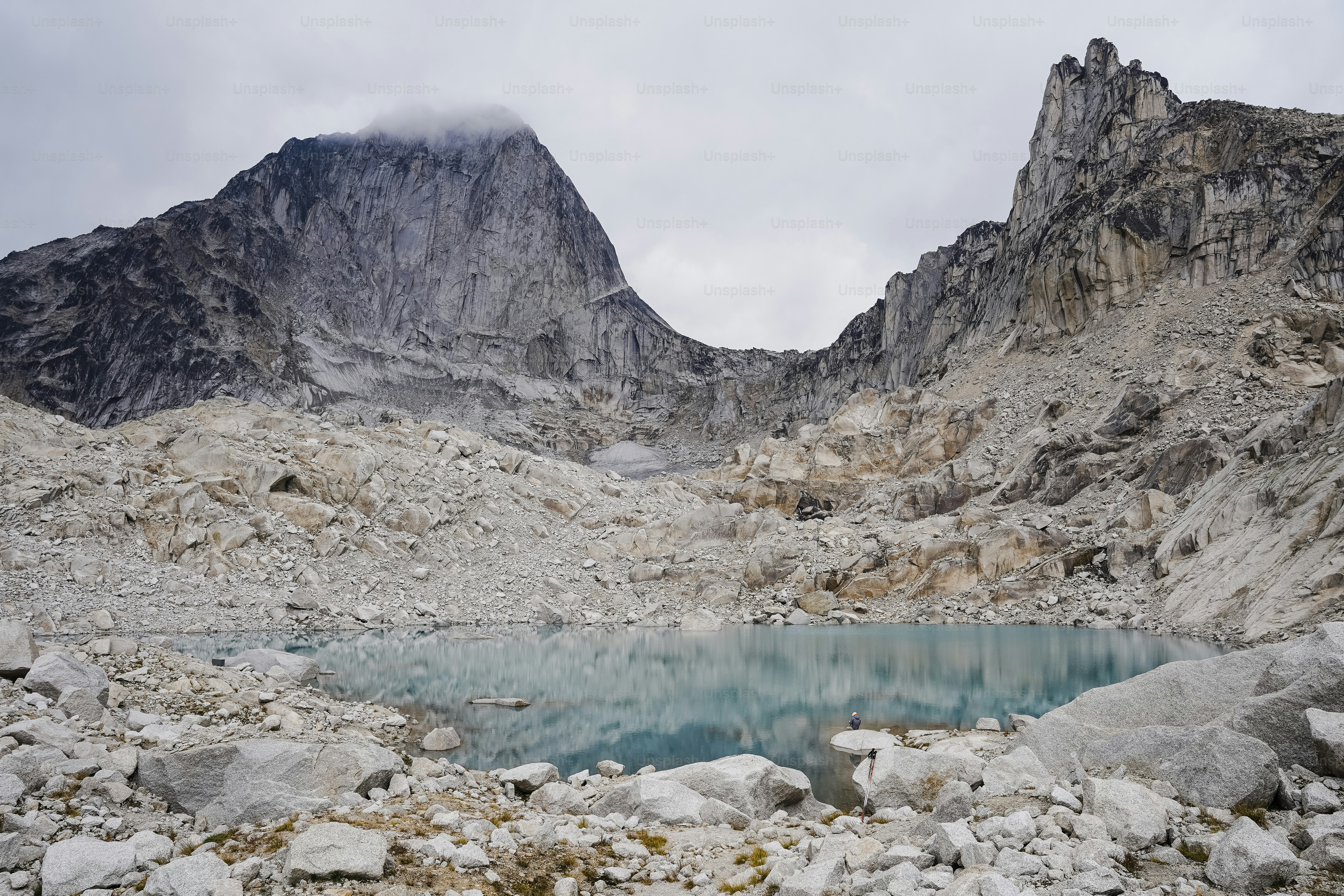 A mountain with a lake in the middle of it