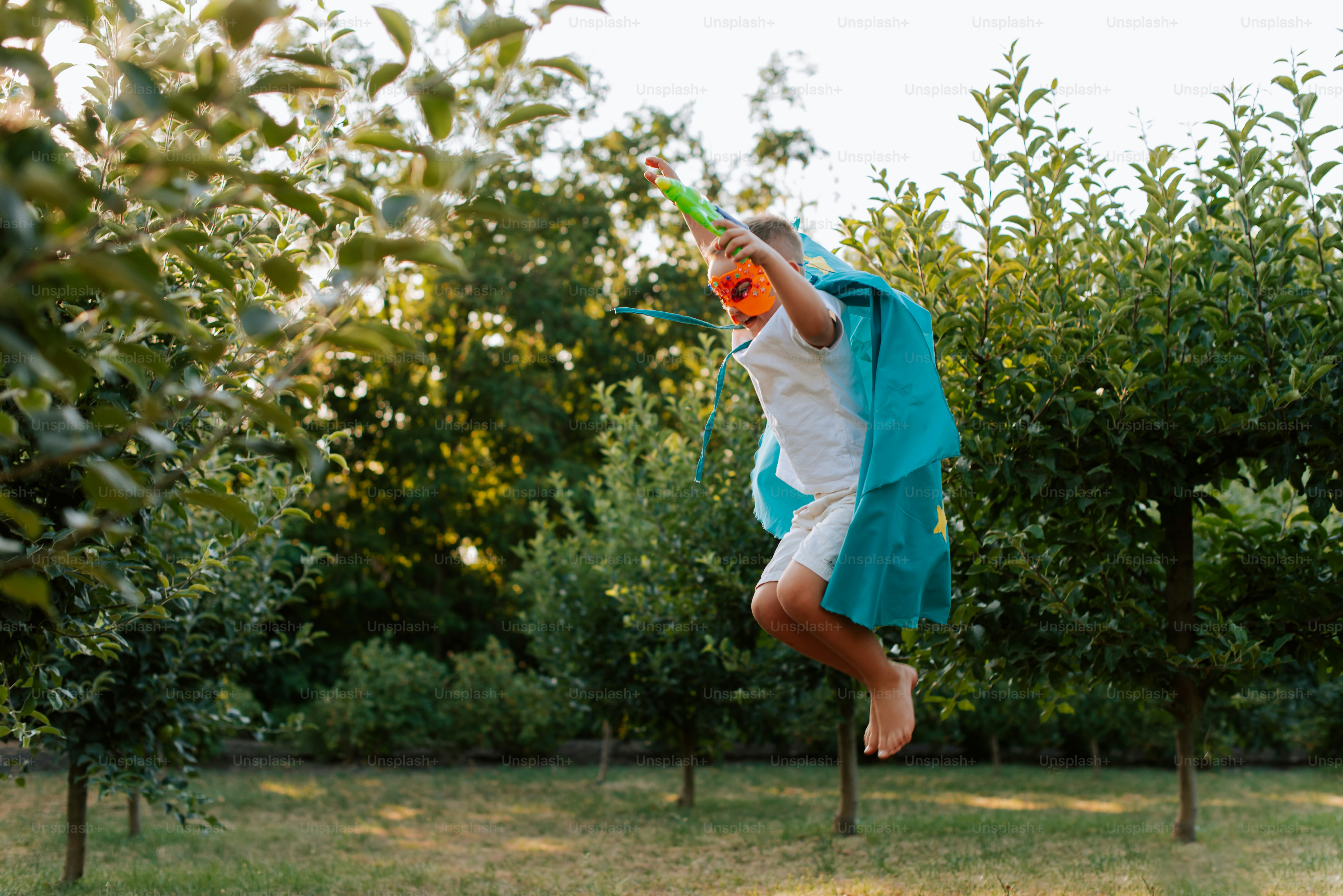 A person jumping in the air with a tennis racket